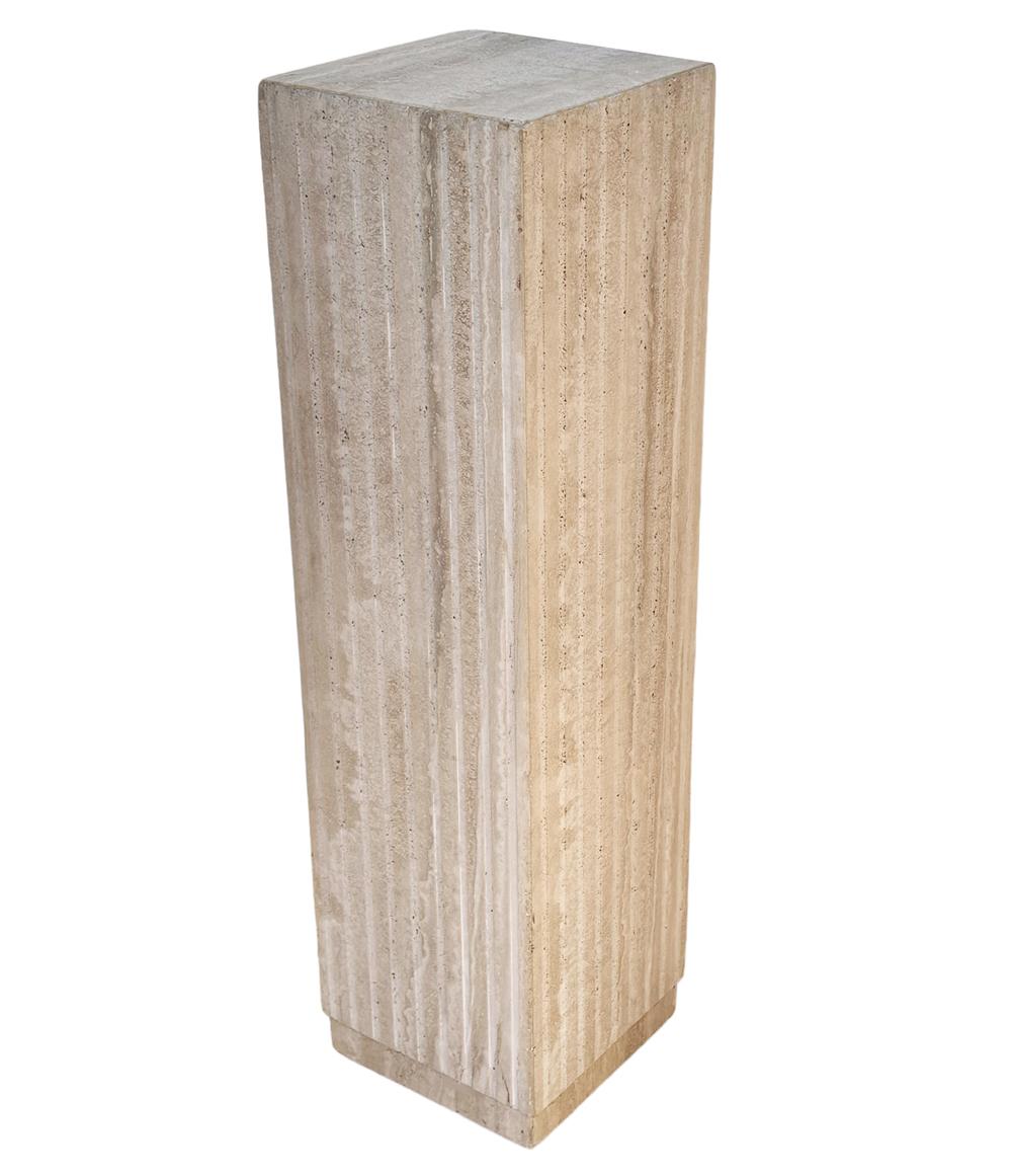 A tall and sleek looking pedestal from Italy, circa 1980s. It consists of thick solid travertine slab construction. Very good condition.