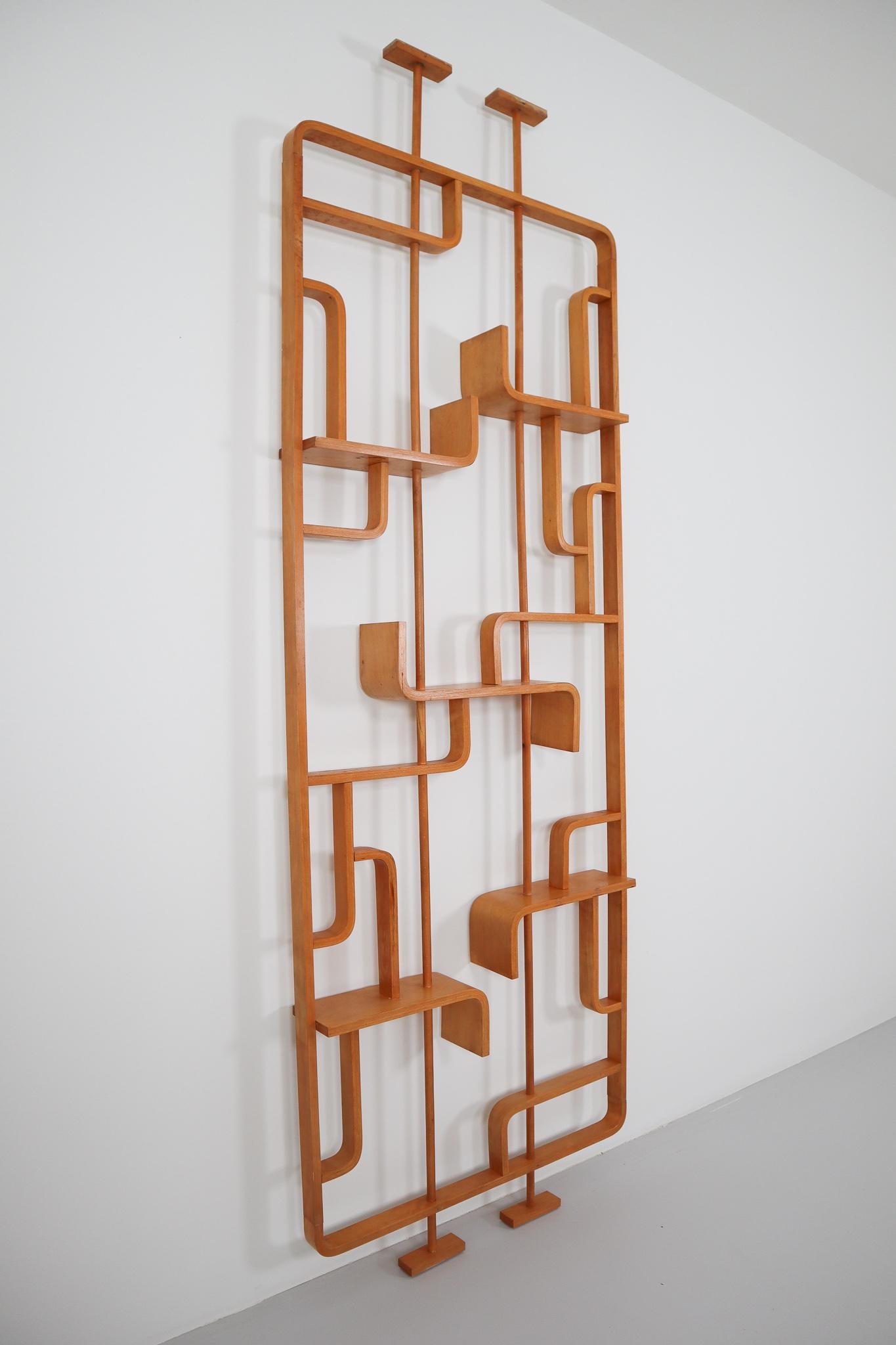 Tall midcentury flower (dividing) wall made of bentwood in blond color plywood and features geometric patterns, designed by Ludvik Volak in the Czech Republic in the 1950s-1960s and manufactured by TON (Thonet) good condition and some minor patina
