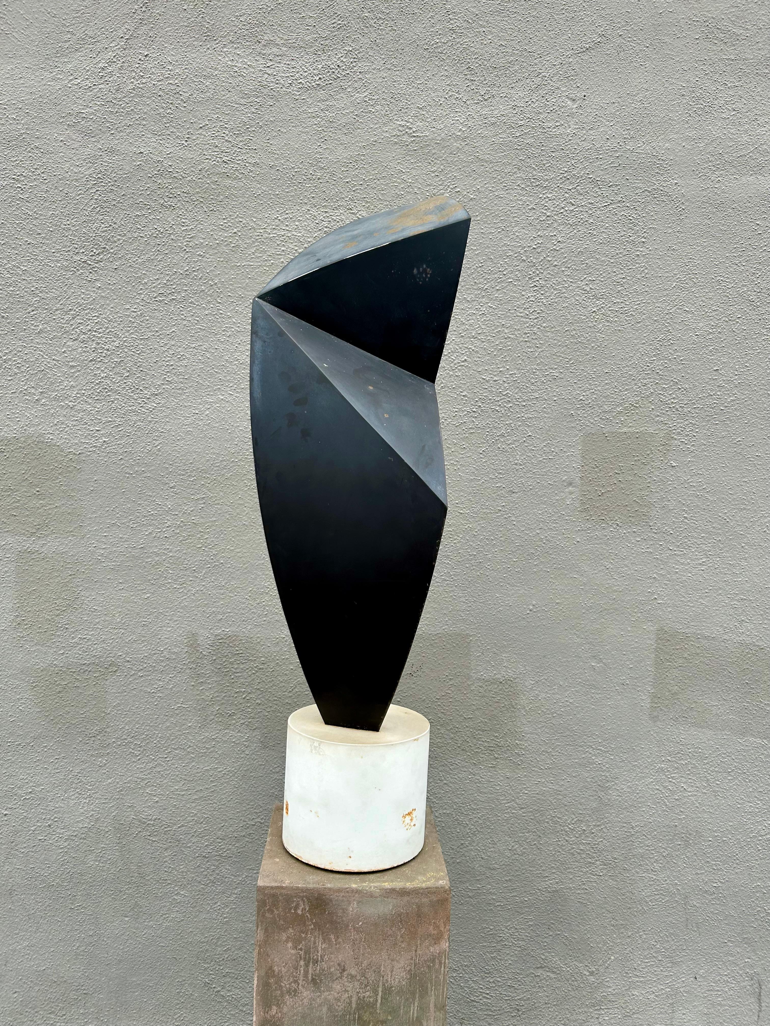 1950 - present
California based artist.
His sculptures are in collections throughout the USA and Europe.
From a Beverly Hills estate.
Great modernist sculpture.
Geometric form on concrete base.
The sculpture sits into a steel ring insert that is