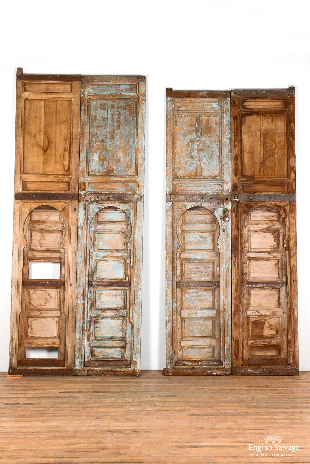 Imposing antique pine double doors, with Judas gates, reclaimed from Marrakech. Size of the larger double doors stated below (B1801), the Judas gate opening is 48cm wide x 179.5cm high. The shorter double doors (B1802) are 147cm wide x 320cm high x