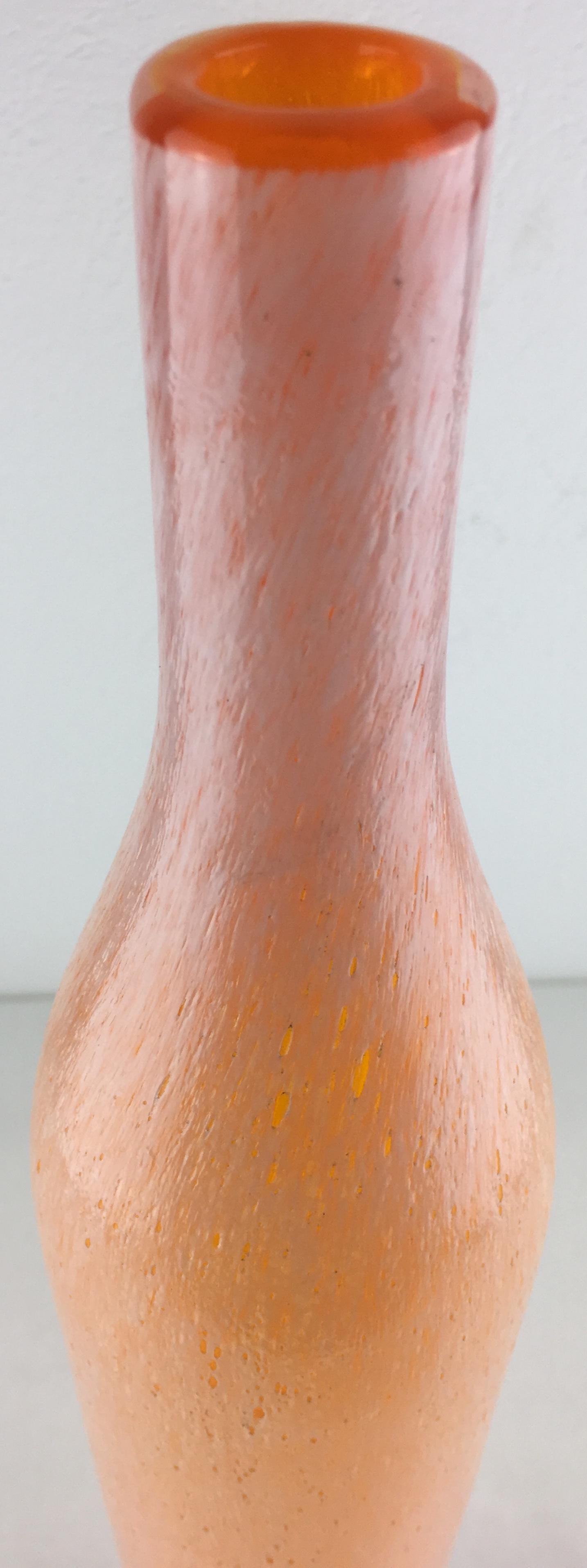 An exquisite hand blown Murano art glass vase in a soft orange, very pleasing to the eye. 

This Italian art glass vase features dots with flecks and a small opening perfect for a single flower or perhaps two. Similar to pieces from the Italian
