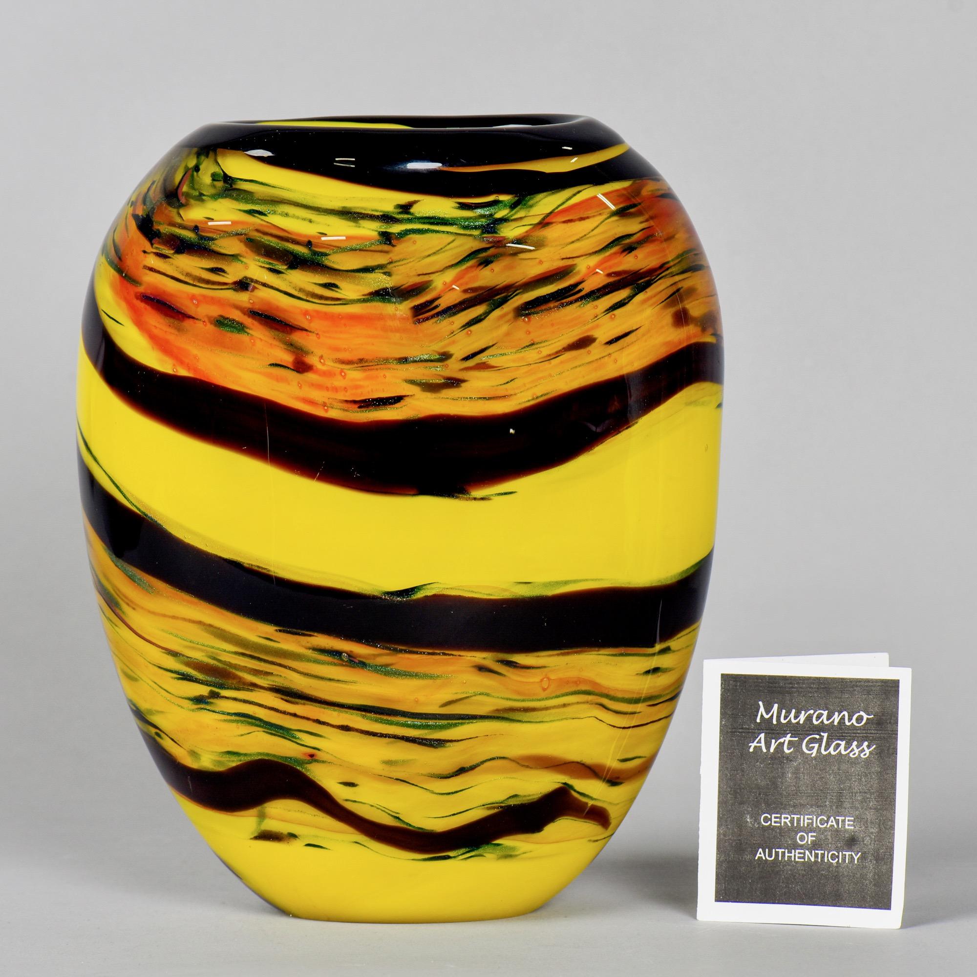 yellow and black vase