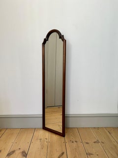 Tall narrow antique wooden scallop frame mirror. France early, 20th century.e