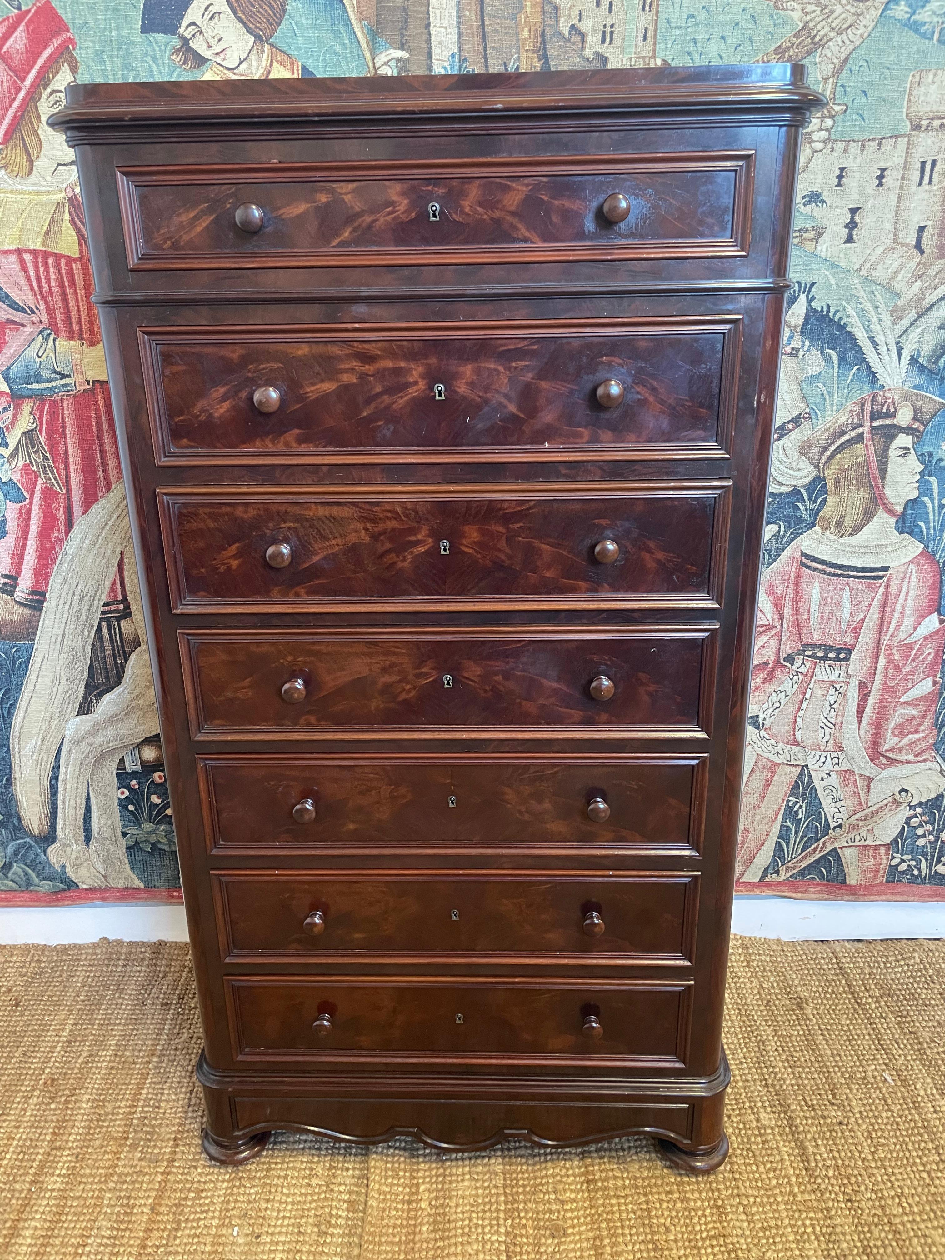Good example of a 19th century mahogany semainier , French tall narrow chest of drawers , a drawer for each day of the week
Circa 1870’s from the Napoleon III period , with original turned mahogany handles , working locks and a key
This piece has