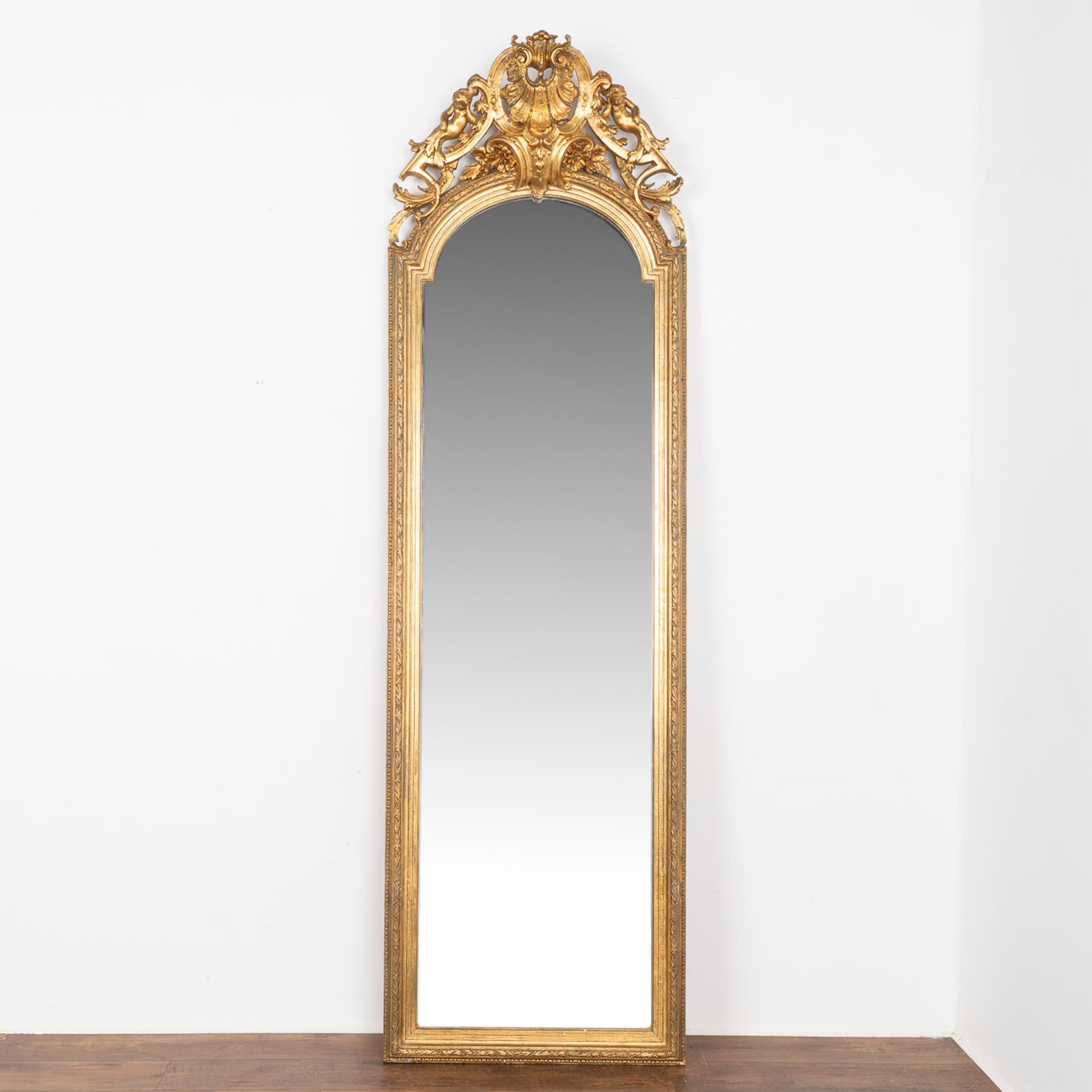 long narrow gold mirror