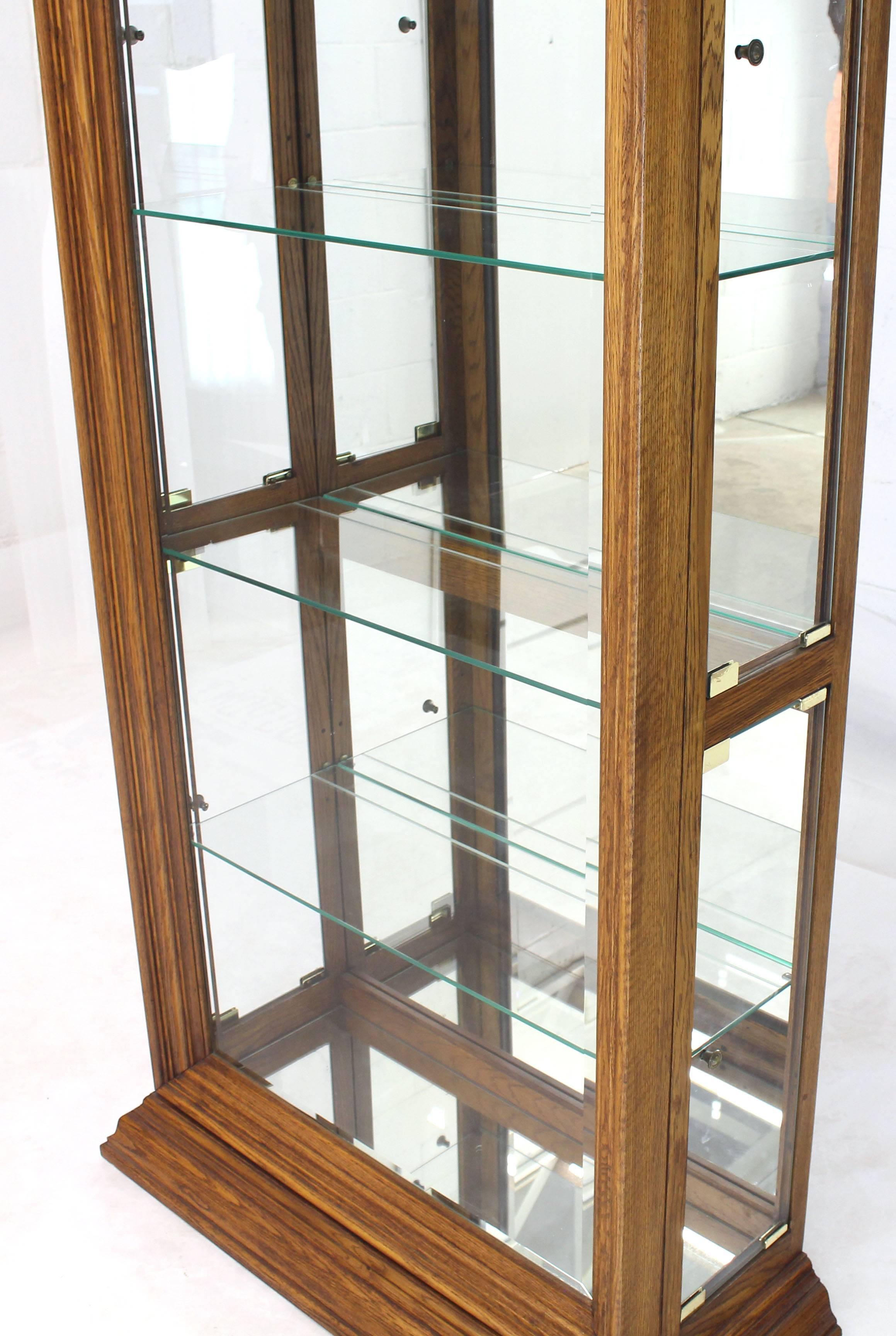 20th Century Tall Narrow Side Doors Beveled Glass Oak Curio Display Cabinet