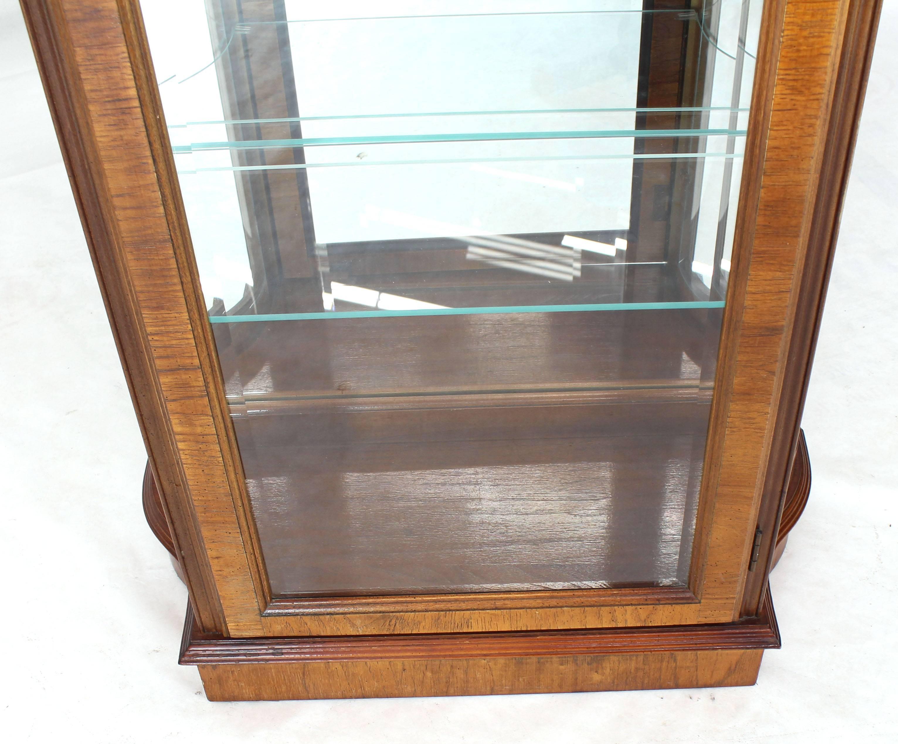 20th Century Tall Narrow Walnut and Mahogany Curved Glass Curio Cabinet