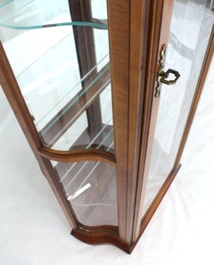 Tall Narrow Walnut and Mahogany Curved Glass Curio Cabinet