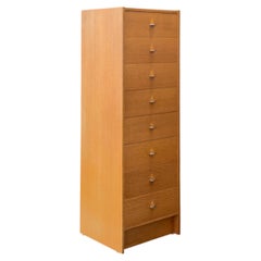 Commode haute en chêne avec poignées chromées