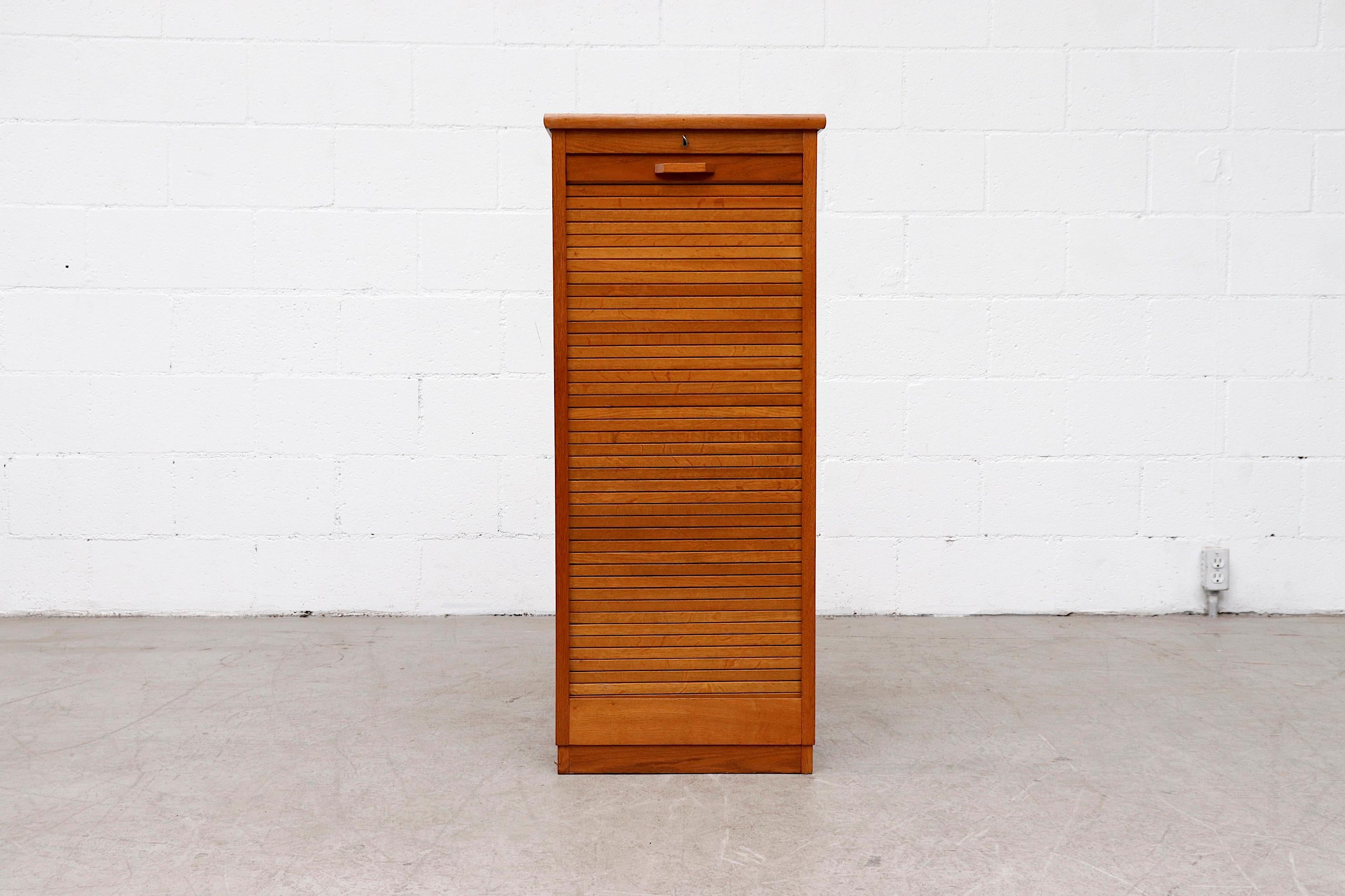 Dutch Tall Oak Eeka File Cabinet with Tambourd Door