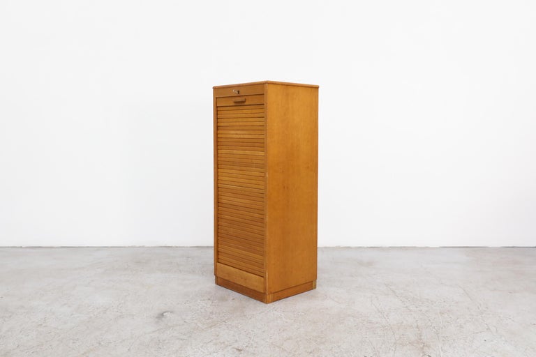 Late 20th Century Tall Oak Eeka Filing Cabinet with Tambour Door For Sale