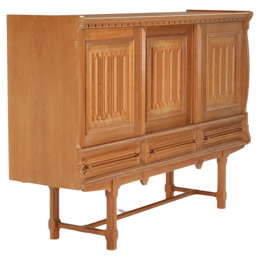 Tall Oak Sideboard in the Manner of Henry Kjaernulf For Sale