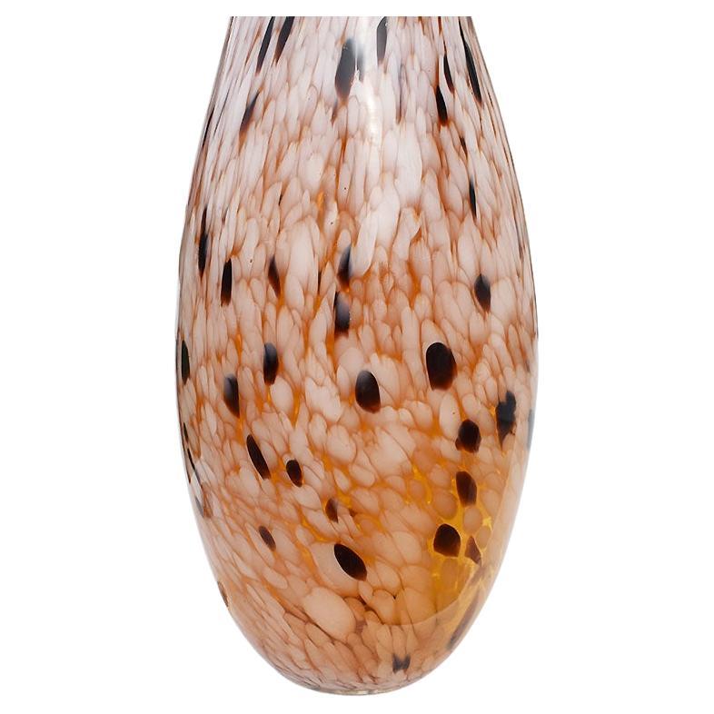 Tall art glass tan tortoiseshell pattern sculptural glass vase. A wonderful tall oblong vessel screaming to be displayed. Round in form, the base is tapered, and balloons out at the middle and cinches in at the top. 

A unique and rare pattern