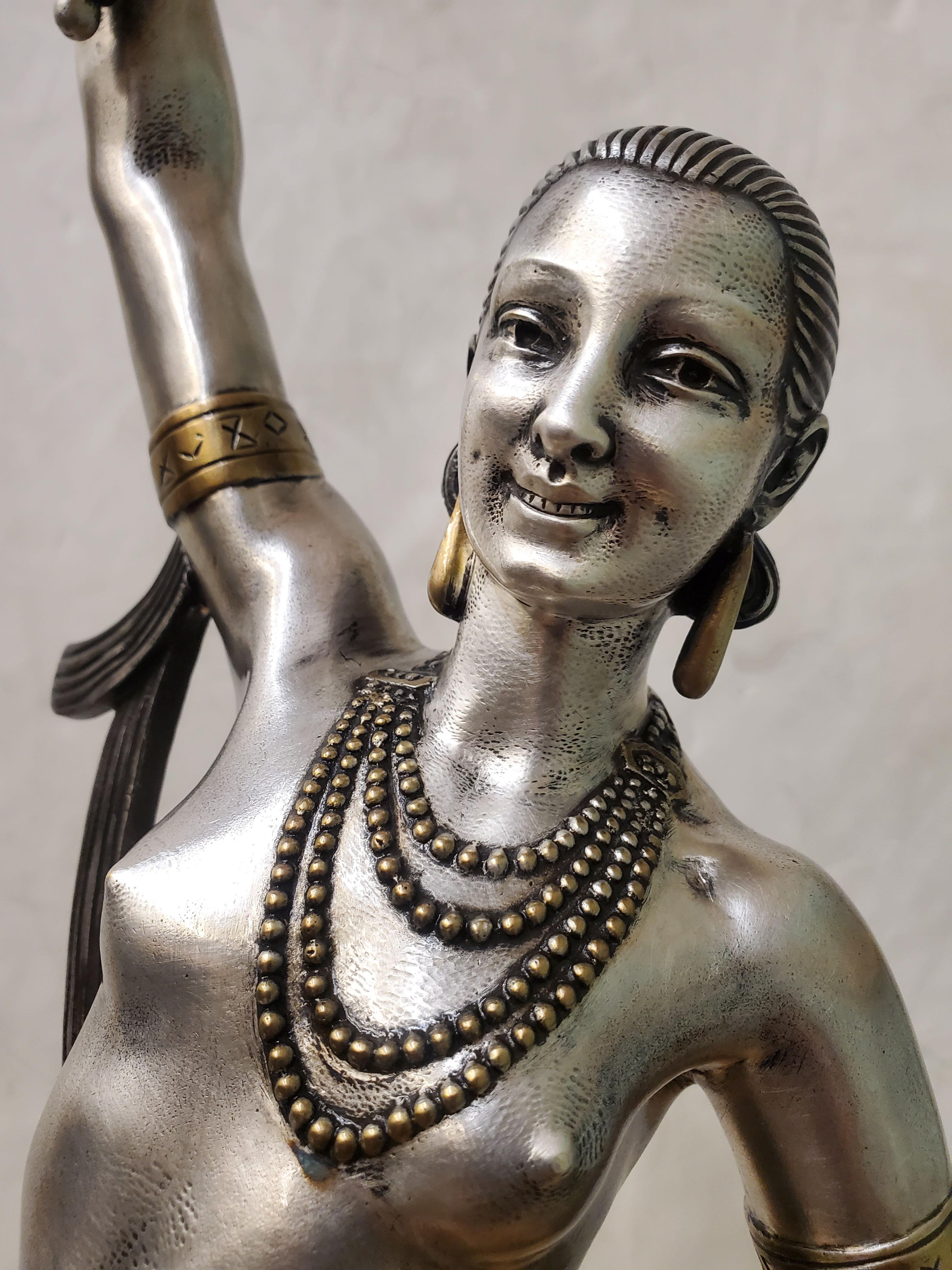 Silvered Tall original French Art Deco dancer by Descomps, patina, silver and gilt bronze For Sale