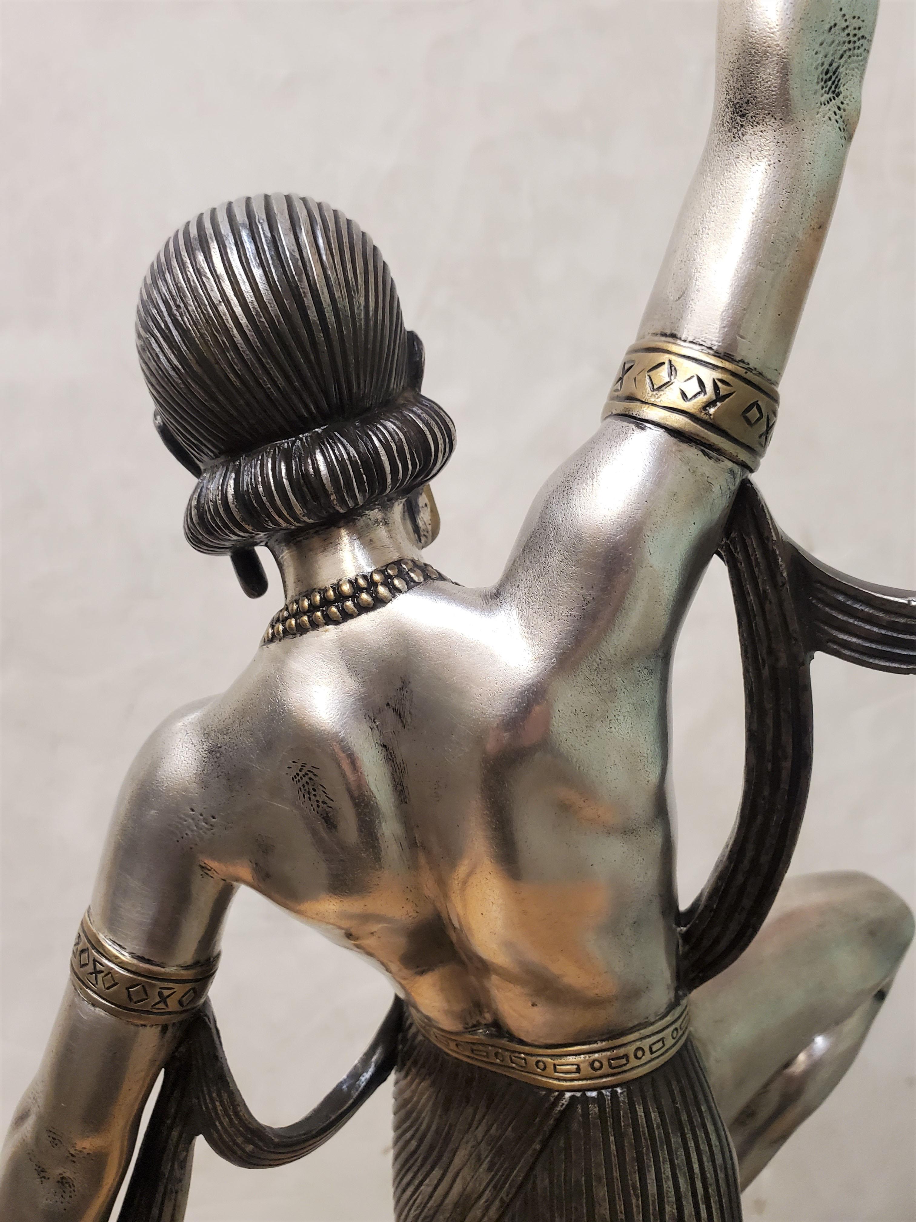 Onyx Tall original French Art Deco dancer by Descomps, patina, silver and gilt bronze For Sale