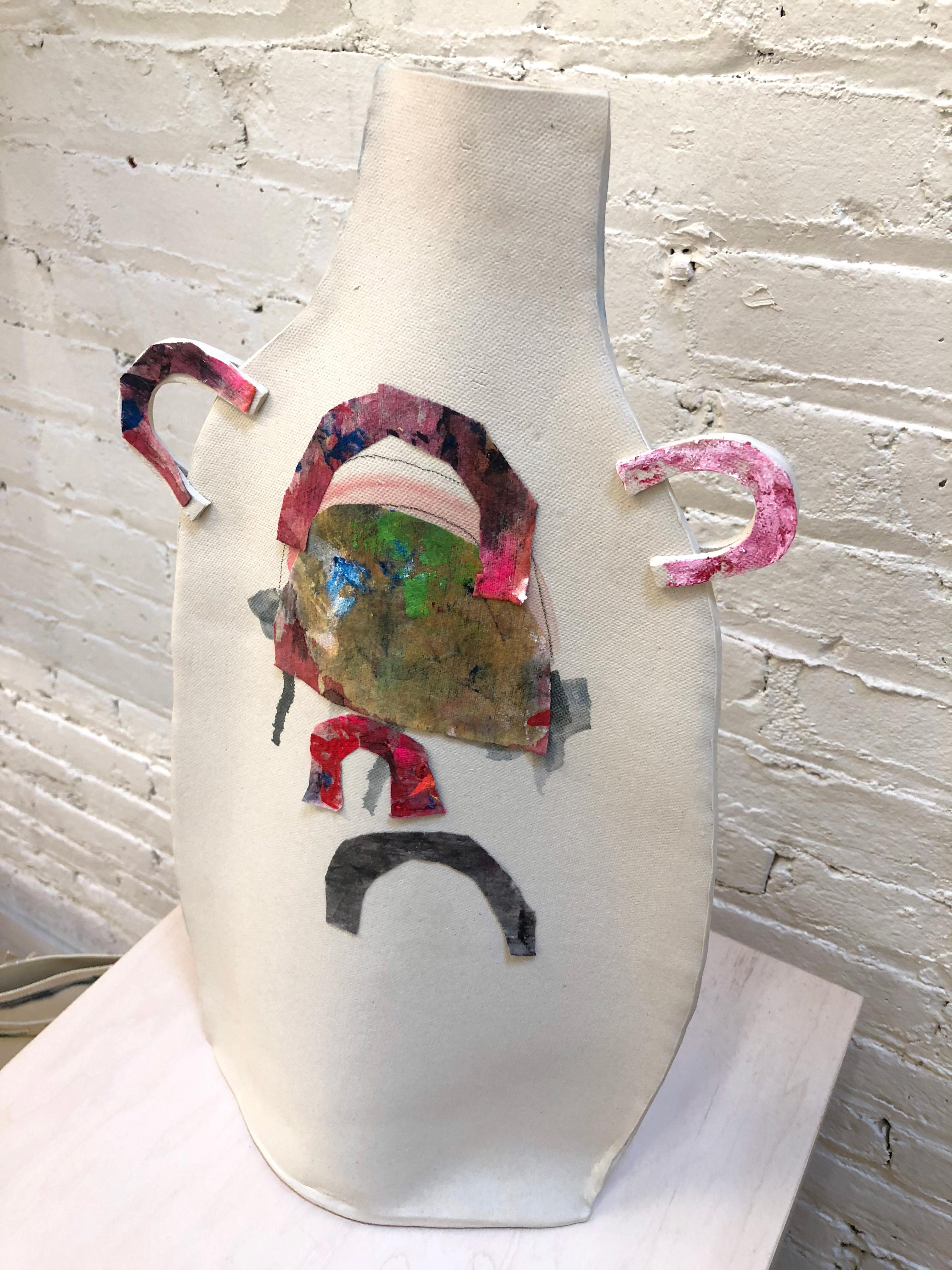 This tall painted double handled flat vase by Alison Owen is made through Owen's skillful hand-building technique, utilizing thin slabs of white porcelain paper clay, hand painted on the outside with glaze, underglaze and oil stick, with a clear