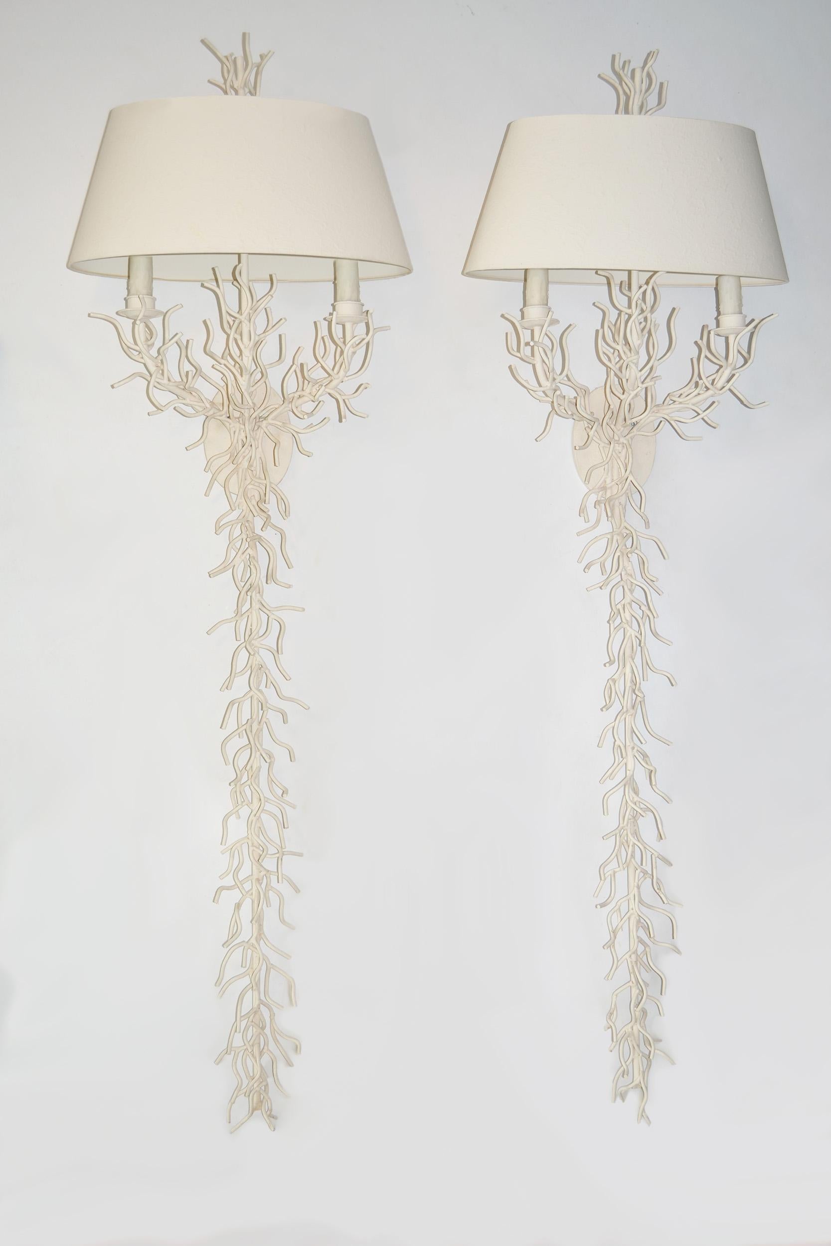 Pair of Faux Coral Wall Sconces with Shades, Regency, Miami Modern 
Pair or set of dramatic, tall mid-century, Regency, neoclassical, Miami modern faux coral wall sconces lamps or lights handcrafted in iron, painted white in a sea-inspired bleached