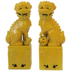 Pair of Tall Midcentury Yellow Foo Dogs or Lion Sculptures