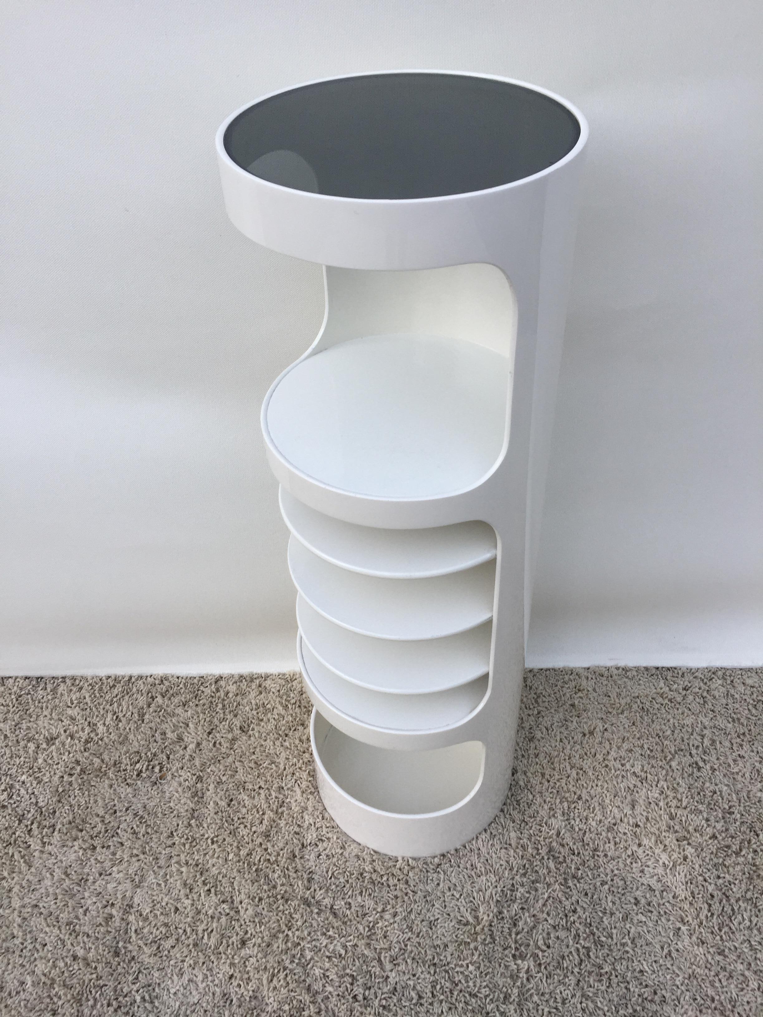 Holland Co., tall white lacquer tiered stand table compartments, great corner piece with dark glass top. Storage, pedestal for towels unique.