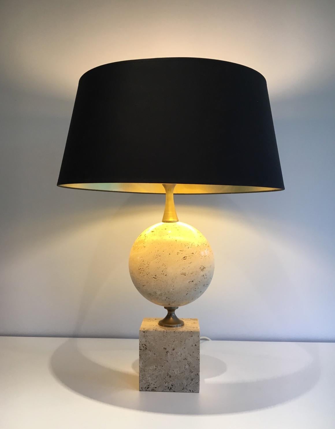 This beautiful and tall lamp is made of travertine and chrome. It is a very interesting model, not common by its size... This lamp is by famous French designer Philippe Barbier, circa 1960.
We have a pair of these lamps.