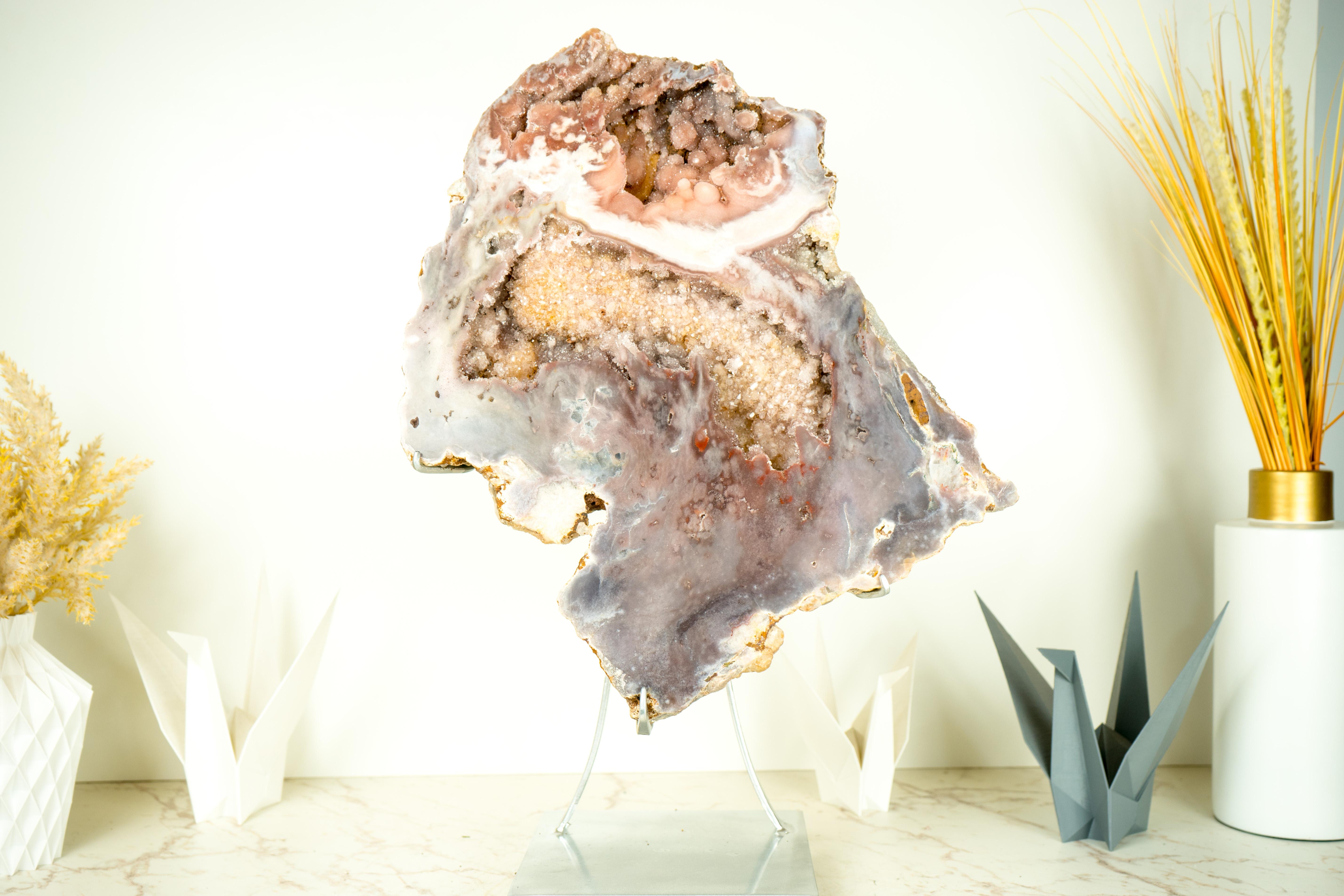 Rare Large Pink Amethyst Geode with Multi Colored Pink, Purple, and Red Druzy and Botroydal Stalactites

▫️ Description

Nature spared no effort when creating this Pink Amethyst, a specimen with spectacular aesthetics, showcasing a symphony of