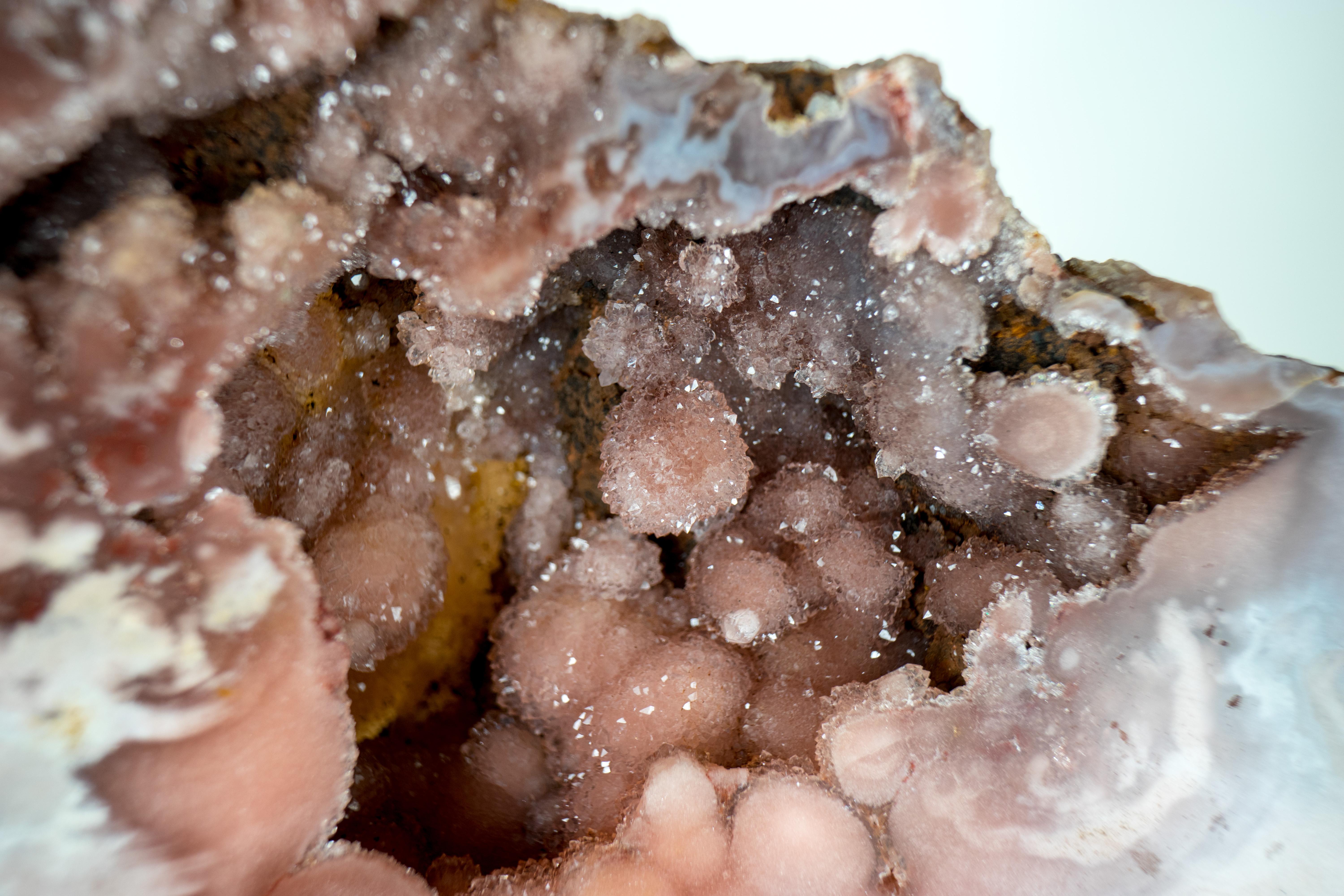 Rare Pink Amethyst Geode with Pink, Red, and Purple Sugar-Druzy Stalacites In Distressed Condition For Sale In Ametista Do Sul, BR