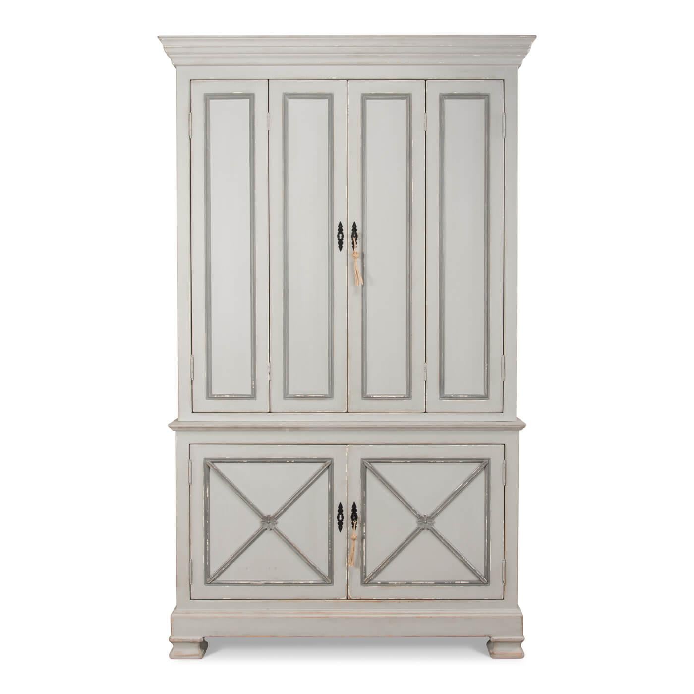 French-inspired tall provincial painted cabinet with a lightly distressed finish. This beautiful cabinet is inspired by an 18th-century French antique. 

The upper cabinet has bi-fold doors and when open reveals two shelves. The lower cabinet has