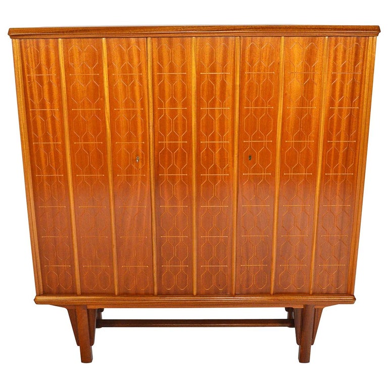 Tall Rastad And Relling Tall Geometric Credenza In Mahogany For