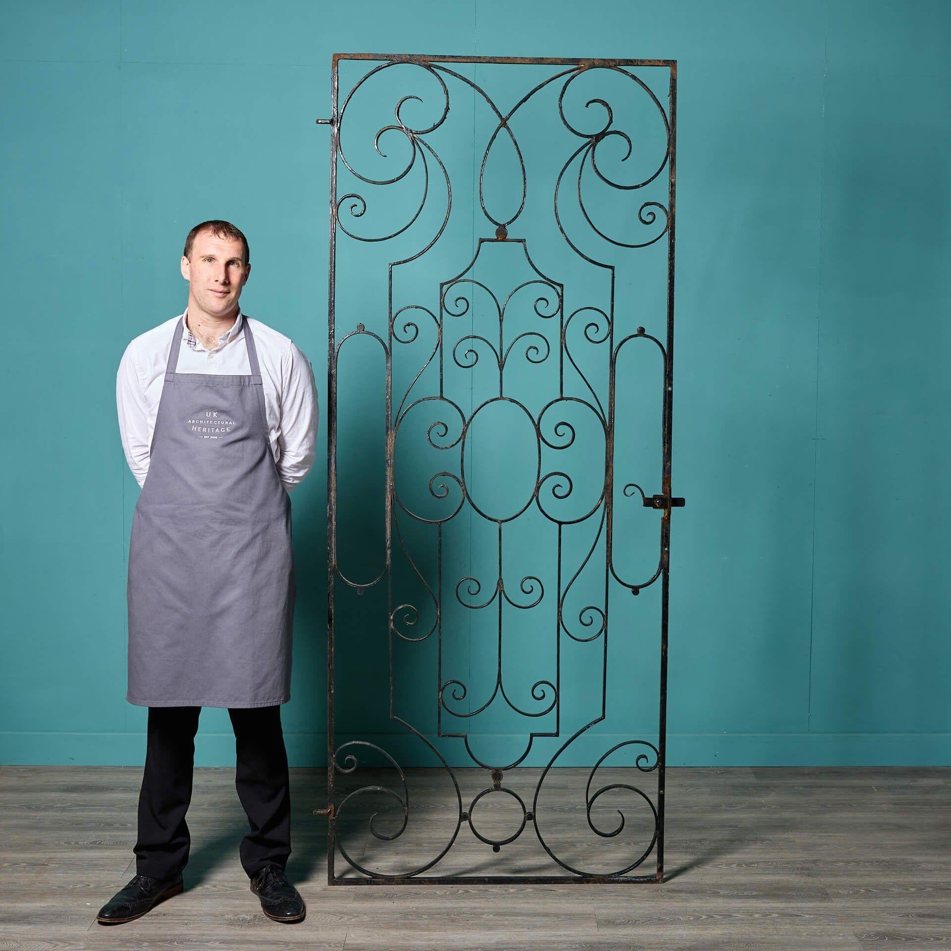 This tall regency style wrought iron side gate is a stylish addition to gardens old and new with its elegant, handcrafted scrollwork and sharp, angular lines.

With its rectangular shape, it is ideal for placement down the side passage of a house,