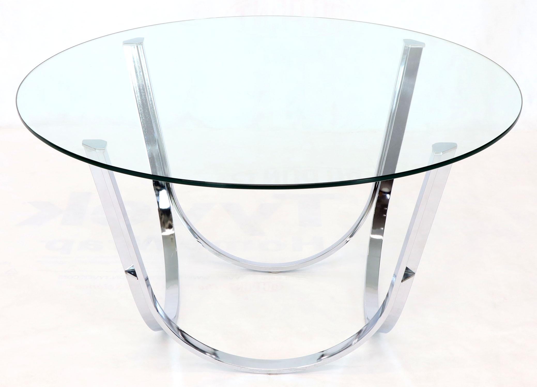 Mid-Century Modern chrome and glass round coffee table by Roger Sprunger for Dunbar. This table is 22