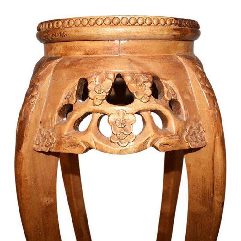 carved wood plant stand