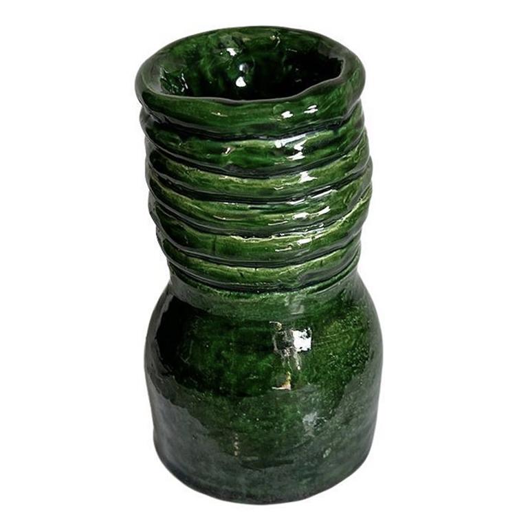 A beautiful rich verdigris green handmade rope vase. This piece stands at nearly 7