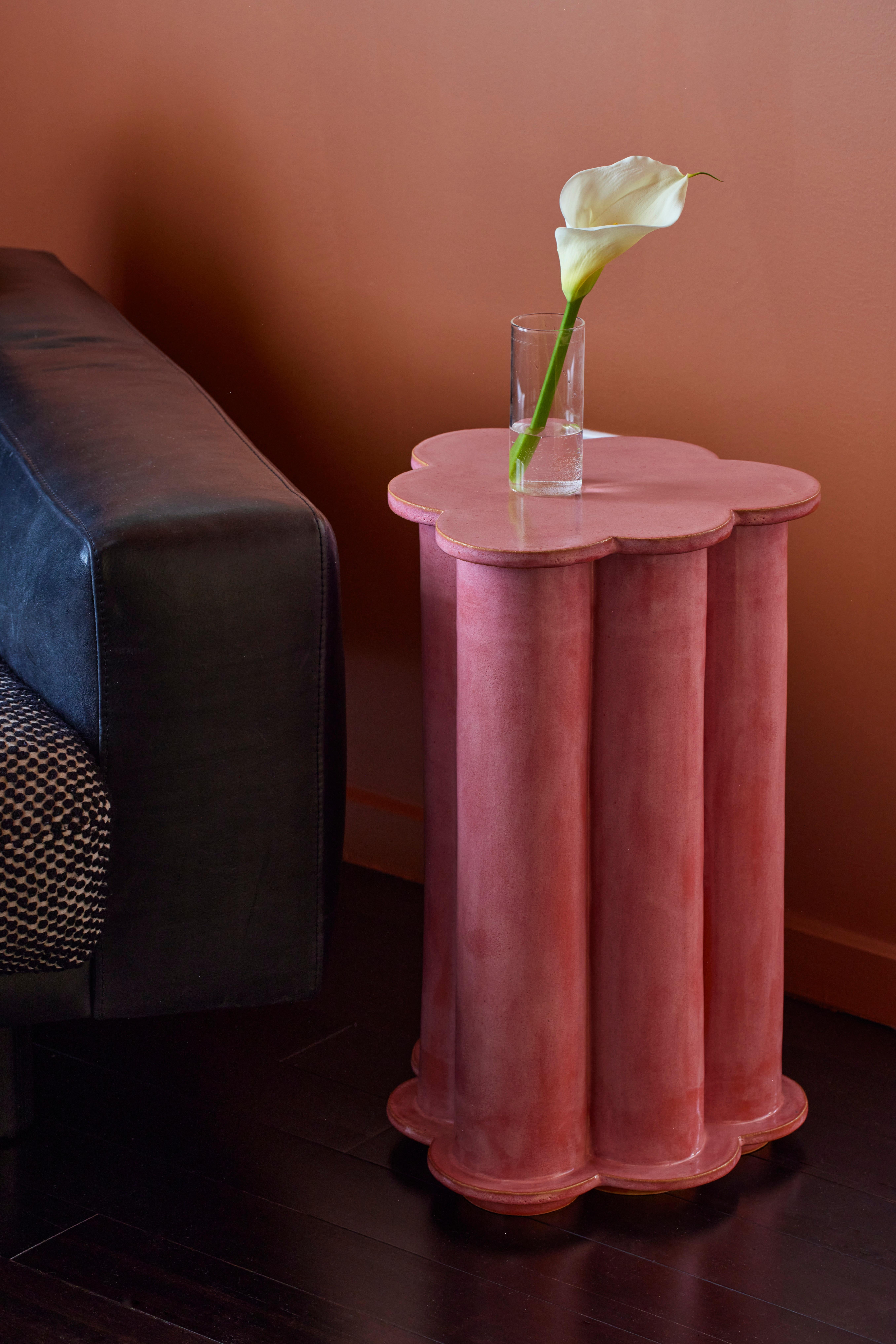 Tall Ruffle ceramic side table in Sunset Pink. Made to order. 

BZIPPY ceramic goods are one-of-a-kind stoneware / earthenware editions including furniture, planters and home accessories. 

Each piece is designed, hand-built, glazed, and fired