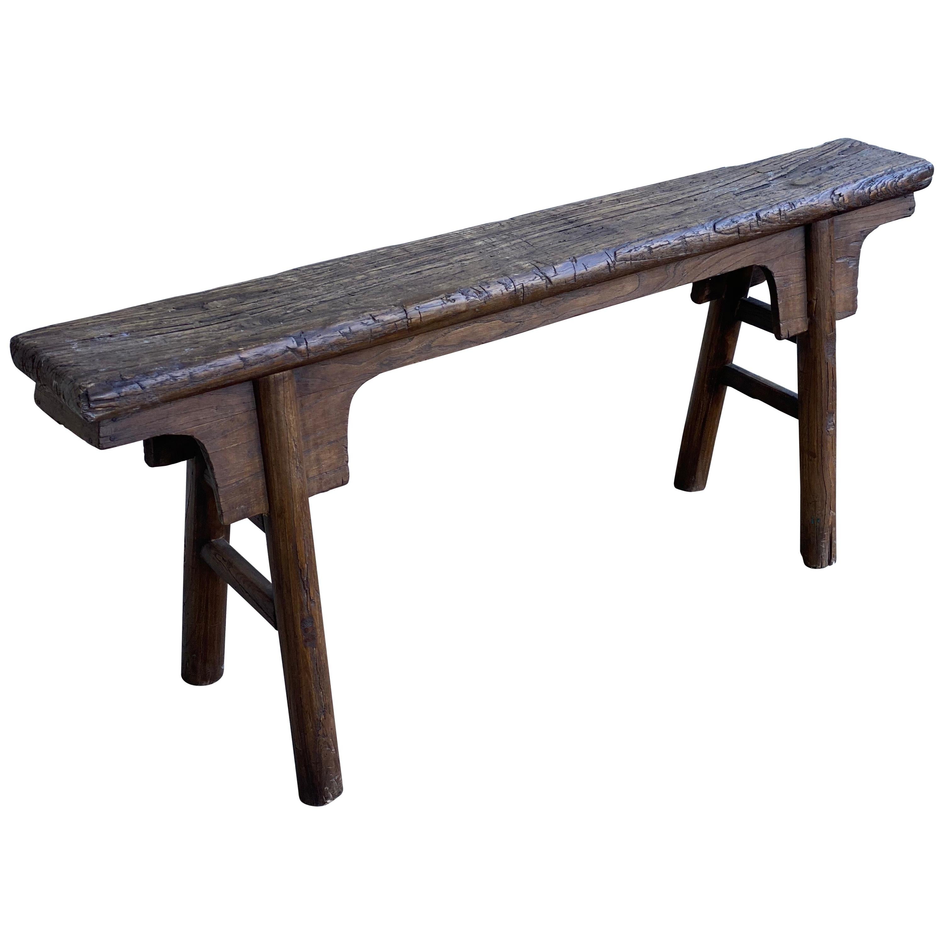 Tall rustic Chinese wood bench. Tall and narrow. A-framed legs.
Import permission wax stamp. Signature on bottom.
Measures: 51 1/8