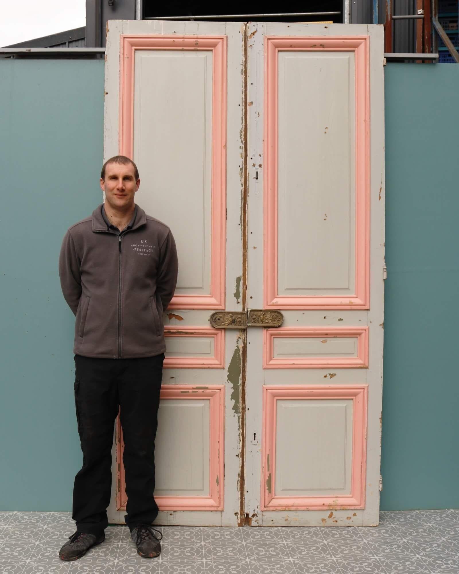 These tall Louis XVI style antique room dividing doors are one of various sets reclaimed from the American Embassy in Paris. This set features an off-white paint finish to one side and pink paint to the moulding on reverse.
Dating from circa 1870,