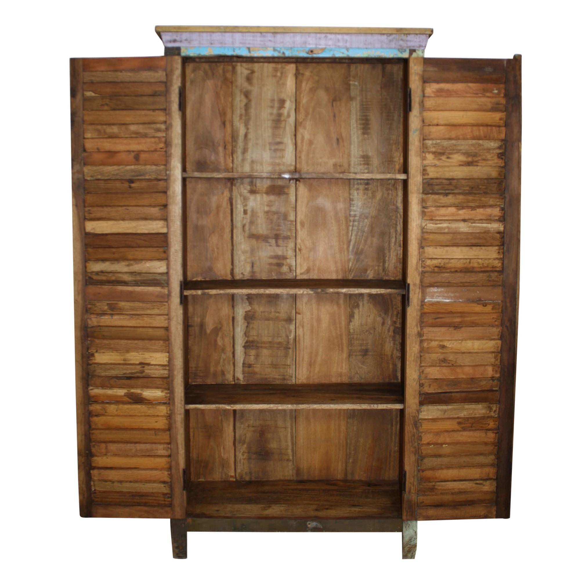 Constructed of solid wood with shutter doors, this cabinet combines simple construction with brightly colored, distressed paint for a unique, eye-catching look that brings texture and charm to any space. The shutter doors open to three shelves,