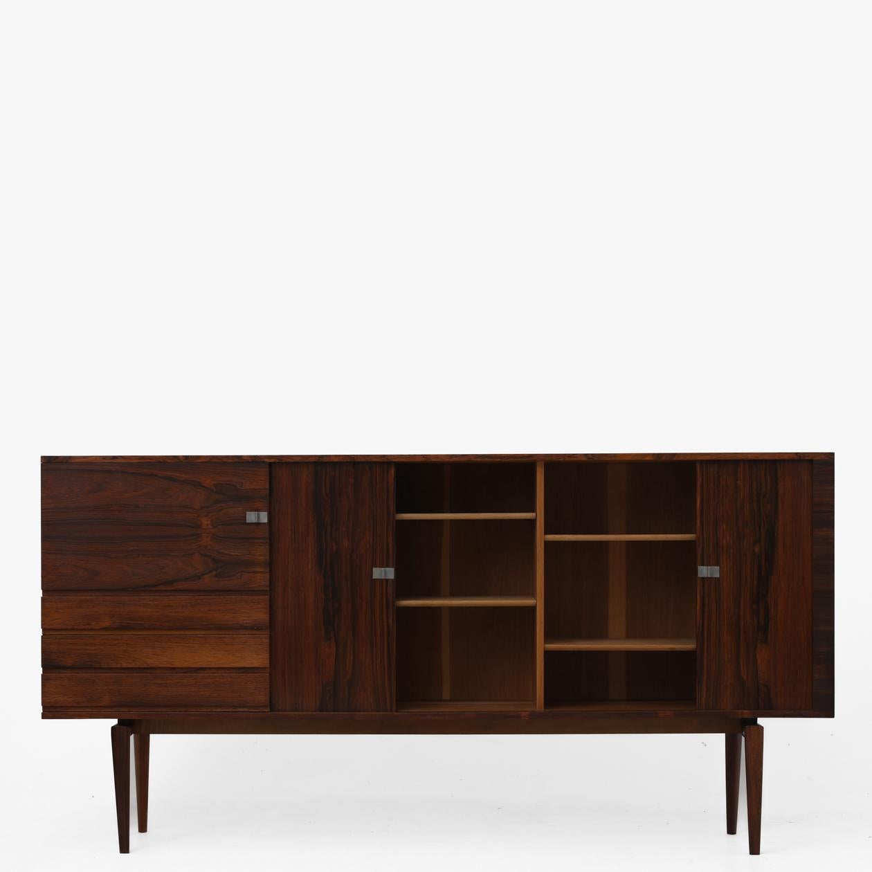 Tall rosewood sideboard with drawers and tambour doors. H. W. Klein / Bramin Møbelfabrik.