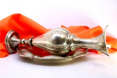 Tall silver water jug