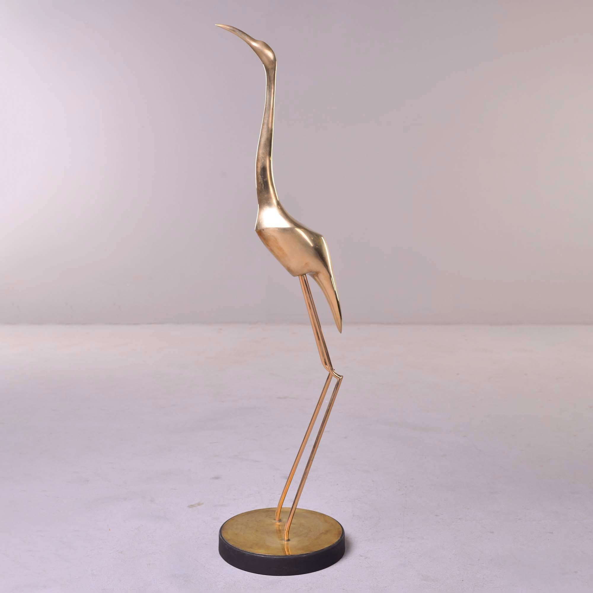 Circa 1991 brass sculpture of crane or heron by Curtis Jere. Base has very, very faint signature and date mark - it is shown in close up photo but can barely be detected. This model / piece is widely attributed to Curtis Jere.