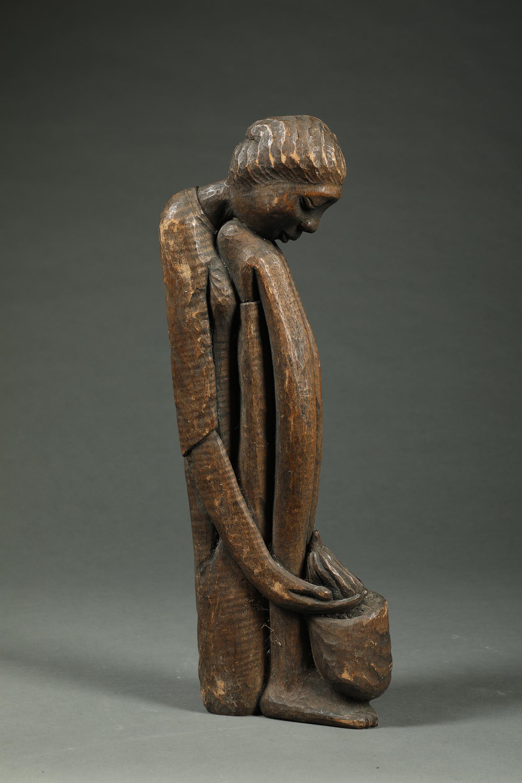 Figura alta y esbelta de madera sentada, Islas del Caribe Mediados del siglo XX Polinesia en venta 2