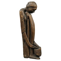 Figura alta y esbelta de madera sentada, Islas del Caribe Mediados del siglo XX Polinesia