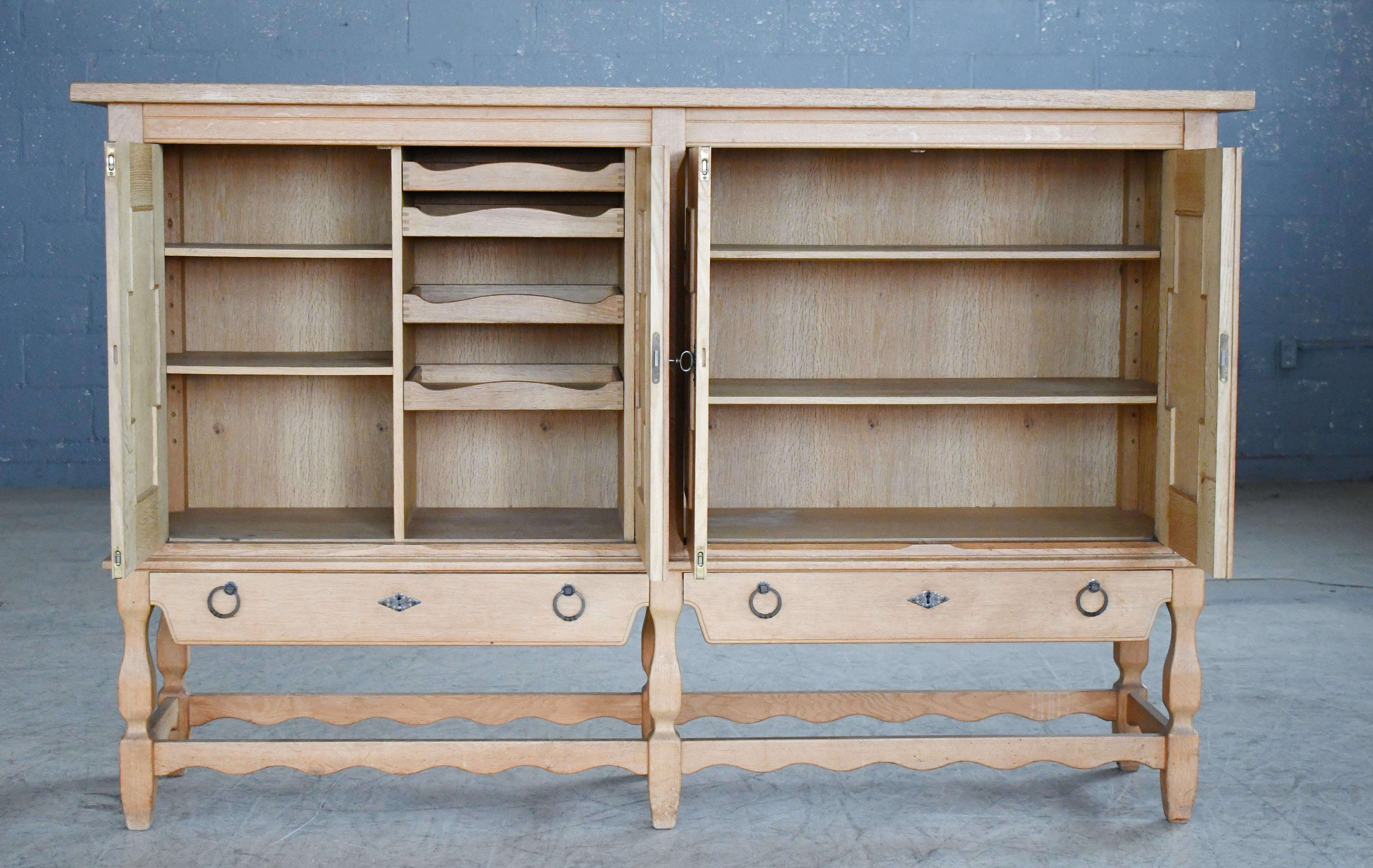 Scandinavian Modern Tall Solid Carved Highboard in Oak by Henning Kjærnulf 1960's For Sale