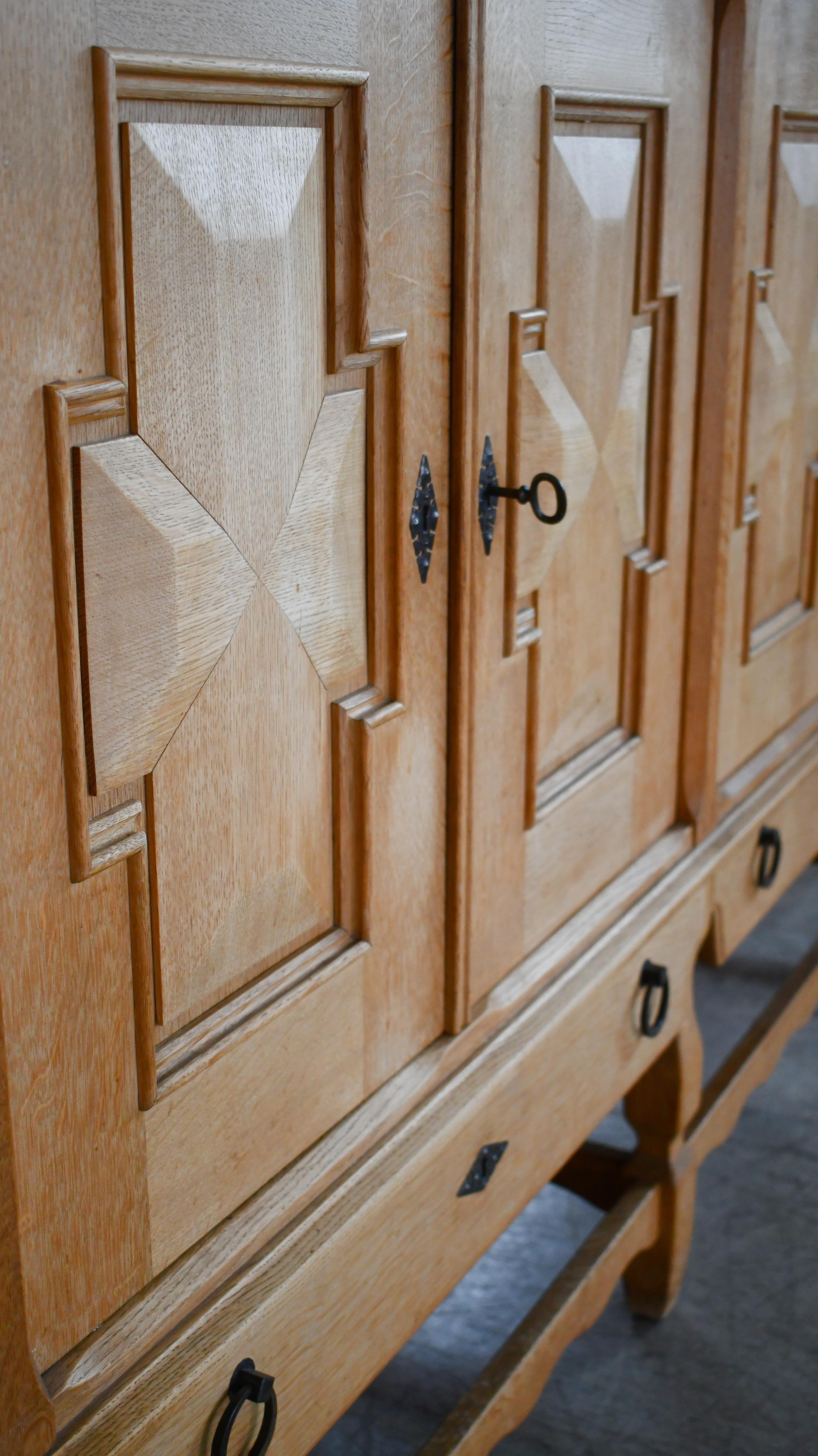 Danish Tall Solid Carved Highboard in Oak by Henning Kjærnulf 1960's For Sale