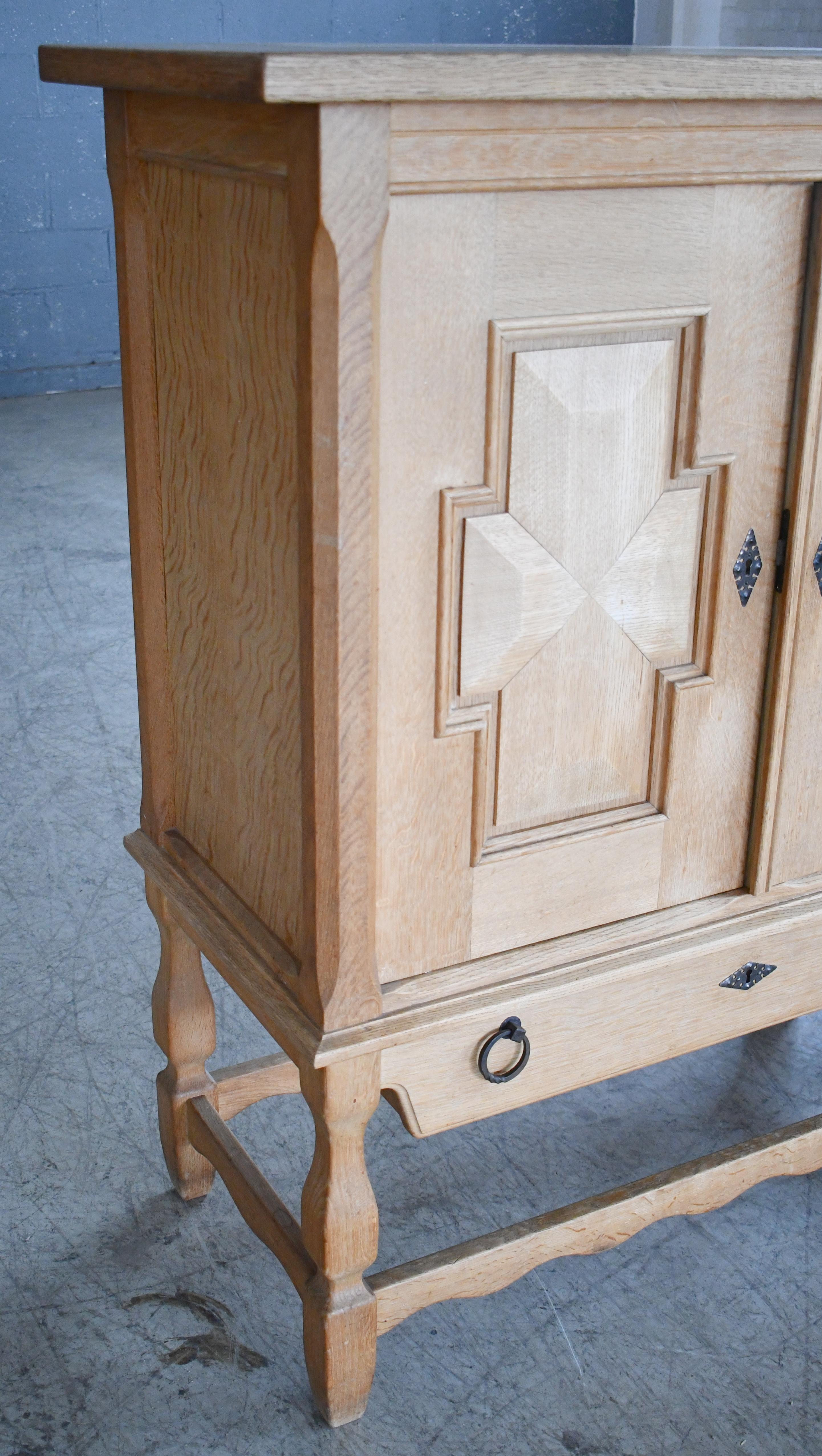 Tall Solid Carved Highboard in Oak by Henning Kjærnulf 1960's In Good Condition For Sale In Bridgeport, CT