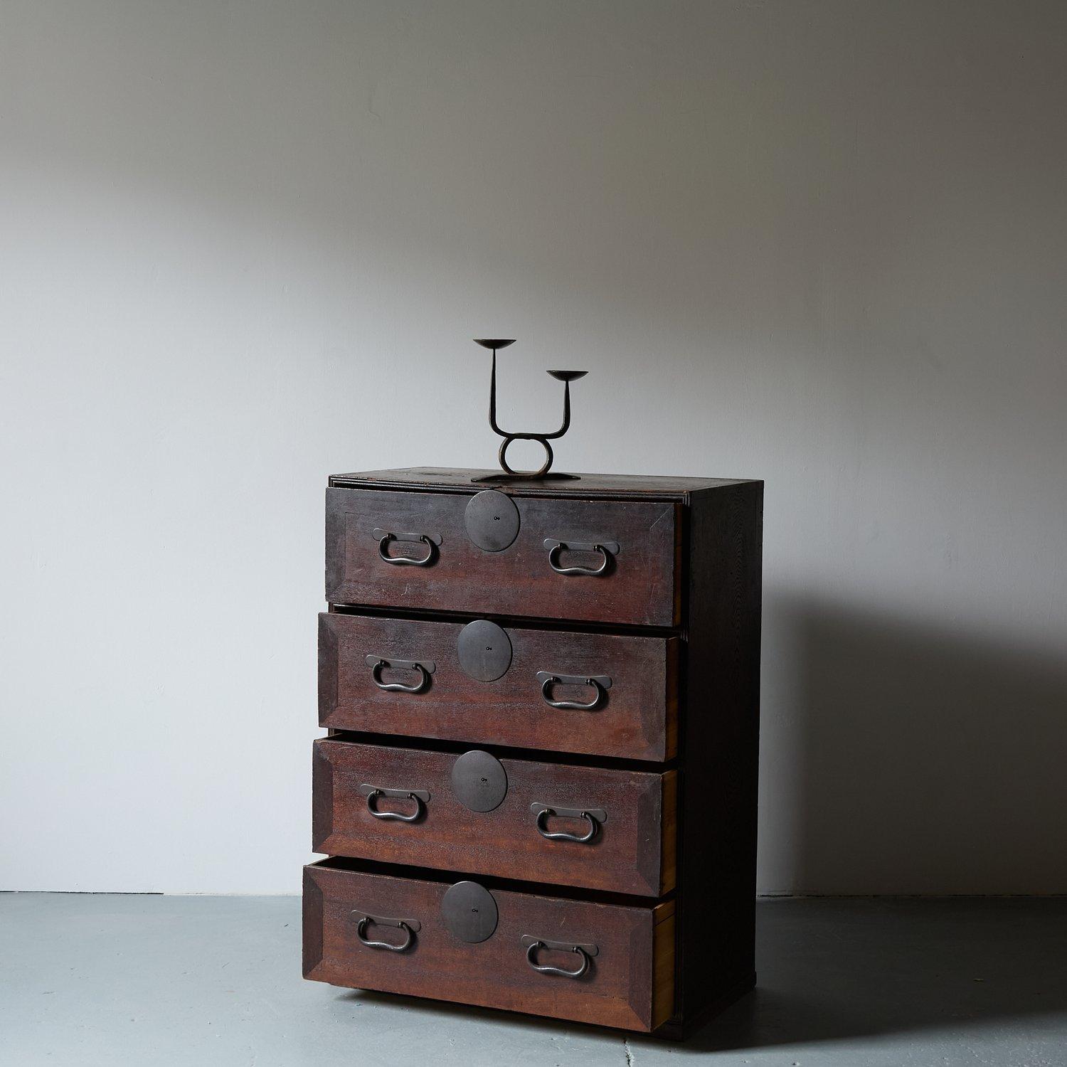 Outstanding Taishō period storage tansu. 

Fine detail, constructed in solid cedar wood. 

Intricately hand forged iron work adorns each deep drawer.   

Japan circa 1915.

H 112cm x W 84.5cm x D 43cm
