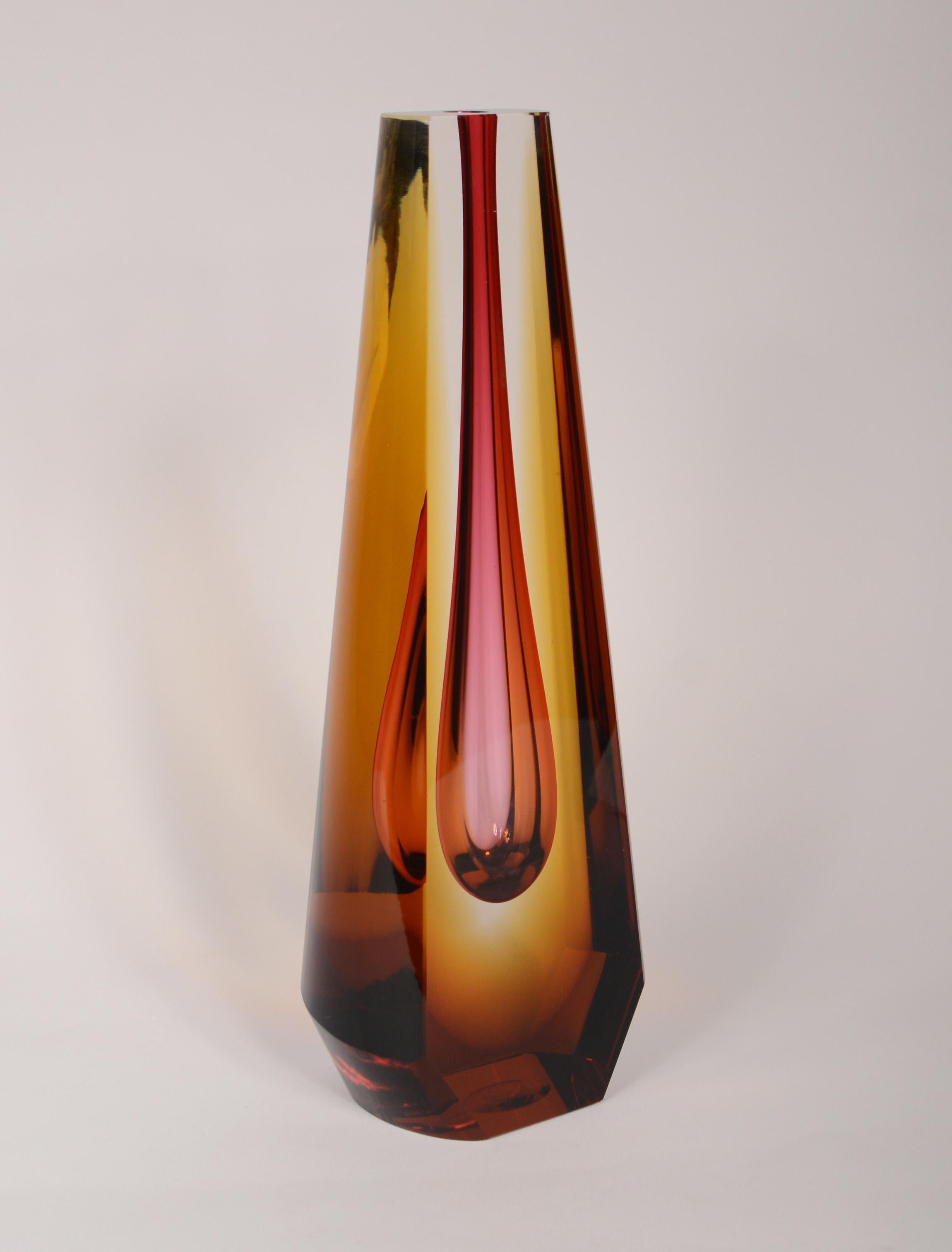 Tall Sommerso vase by Pavel Hlava. The entire vase is cut and polished with curved and flat sides. The color combination on this is outstanding. There is a small nick on the bottom edge.