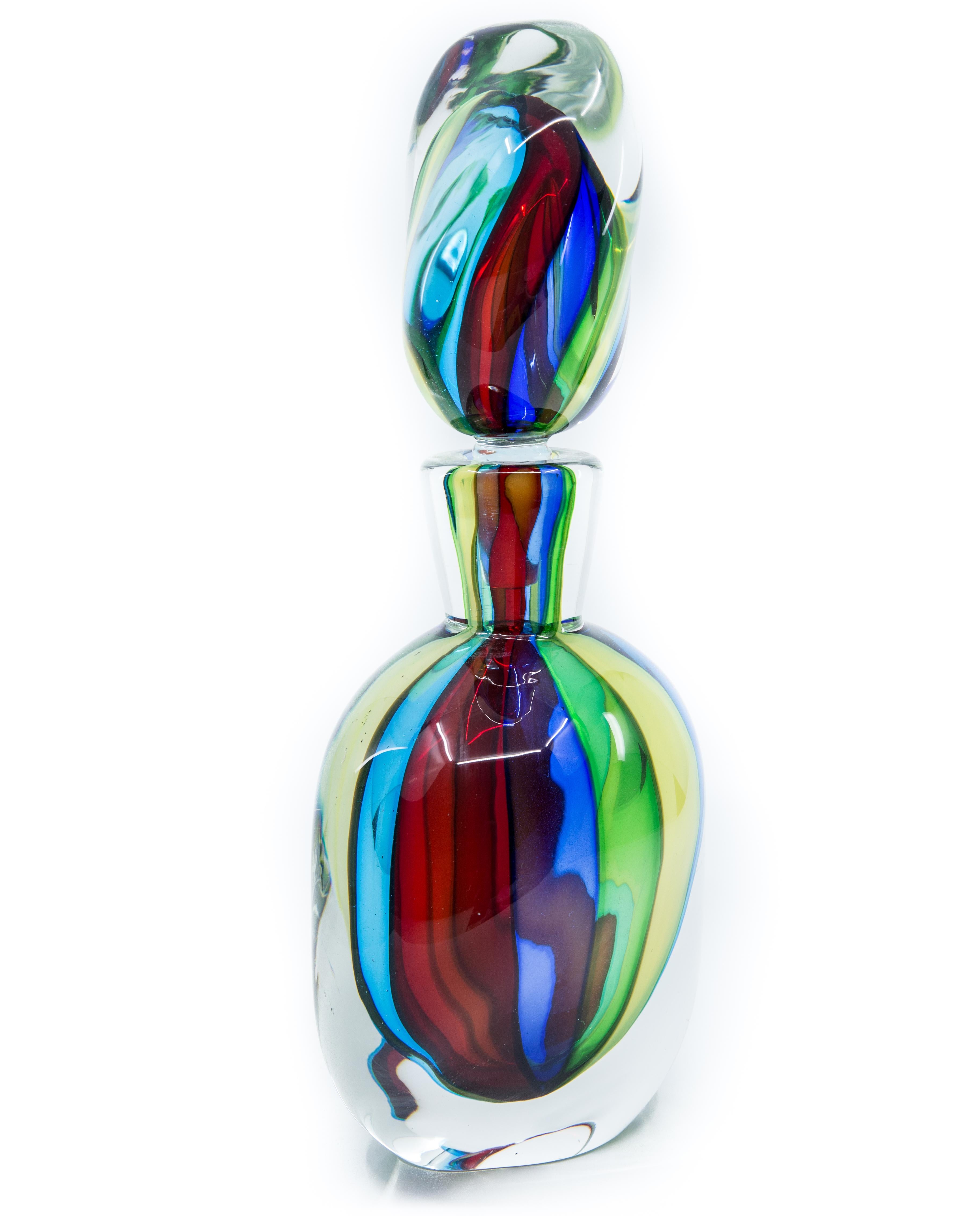 Offered is an excellent hand blown Murano glass Sommerso decanter in good condition complete with original stopper that stands tall at approximately 14” in height. The decanter dates from the 1980s.