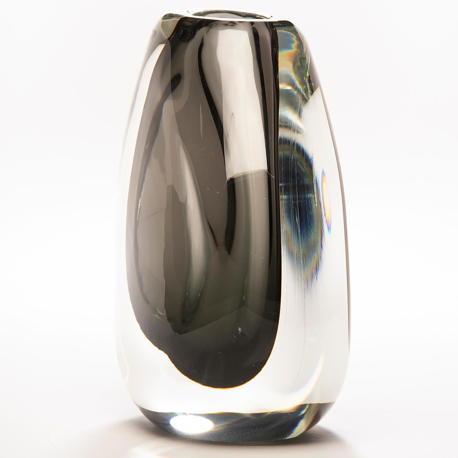 Hand blown in Finland, this Sommerso style art glass vase has a heavy, clear cased glass outer layer and smoke colored core. New with no flaws found.