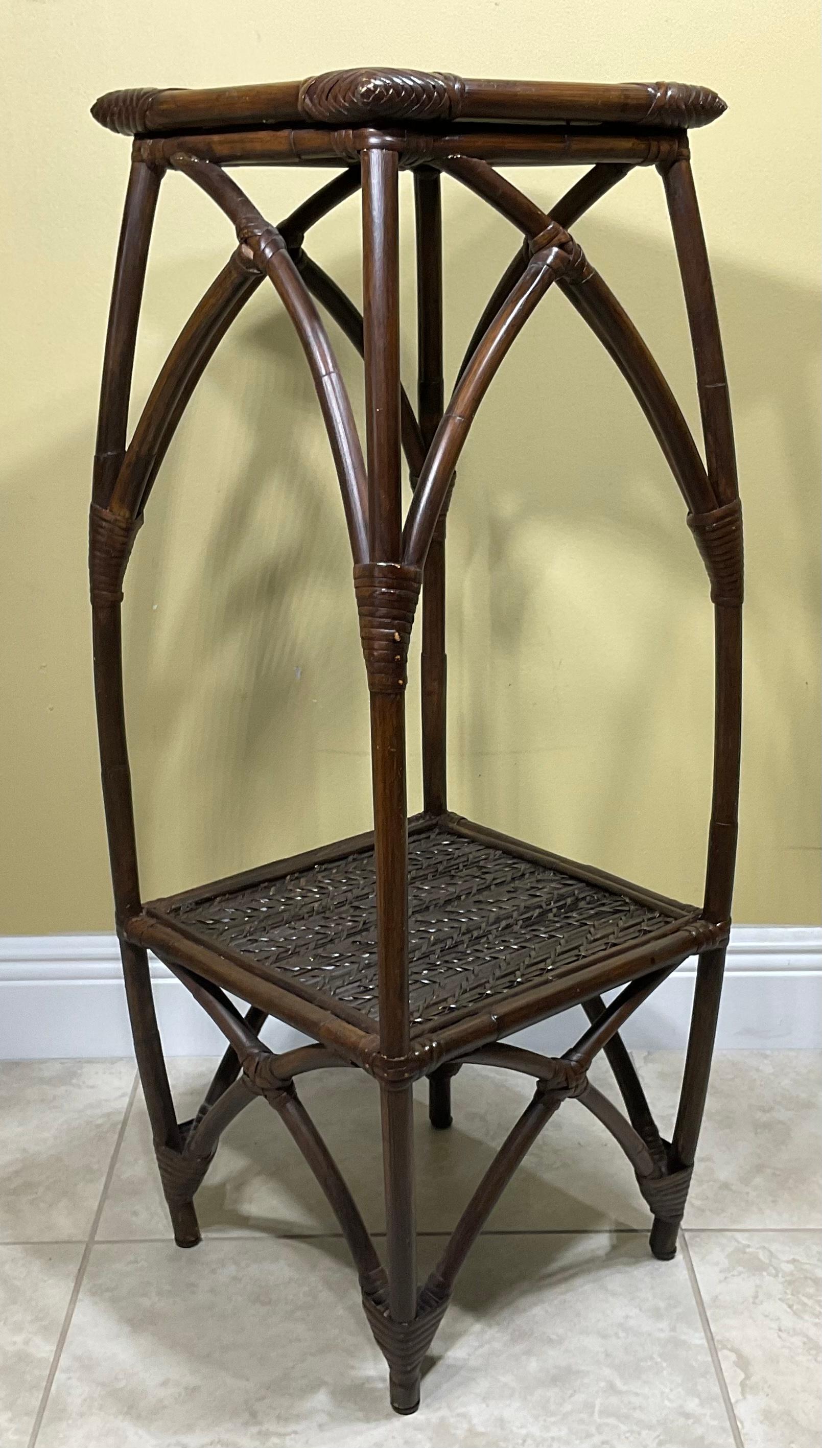 Square Modern bamboo plant stand. This elegant tall square bamboo plant stand is sitting pretty sturdy on the floor with it's decorative side panels. and rich in color, the plant stand also makes a nice pedestal for nice wood sculpture,on the patio