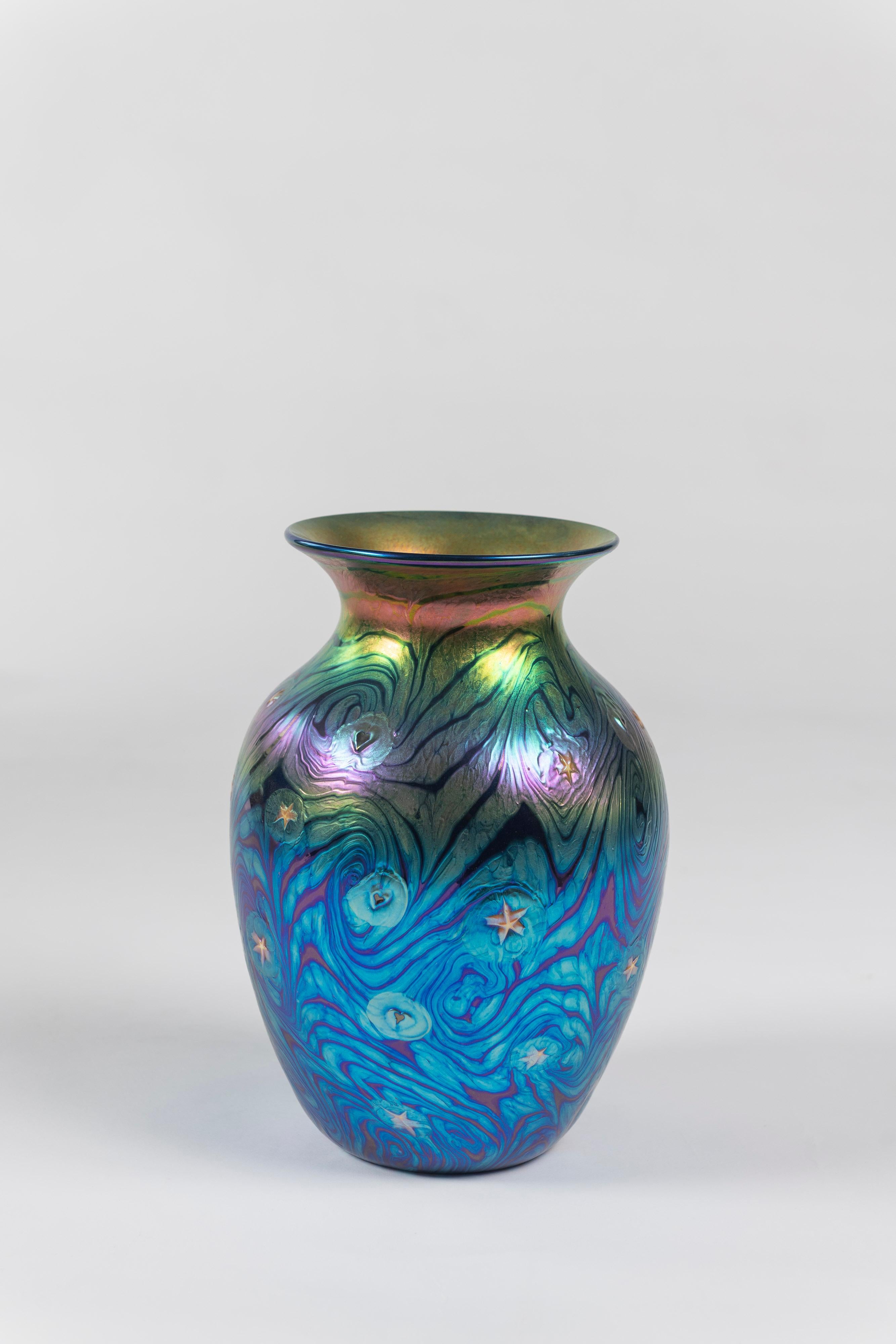 Contemporary art glass vase with “Starry Night” design is made by Lunderg Studios based in Davenport, California. Beautiful colors and great piece to add to a growing collection.